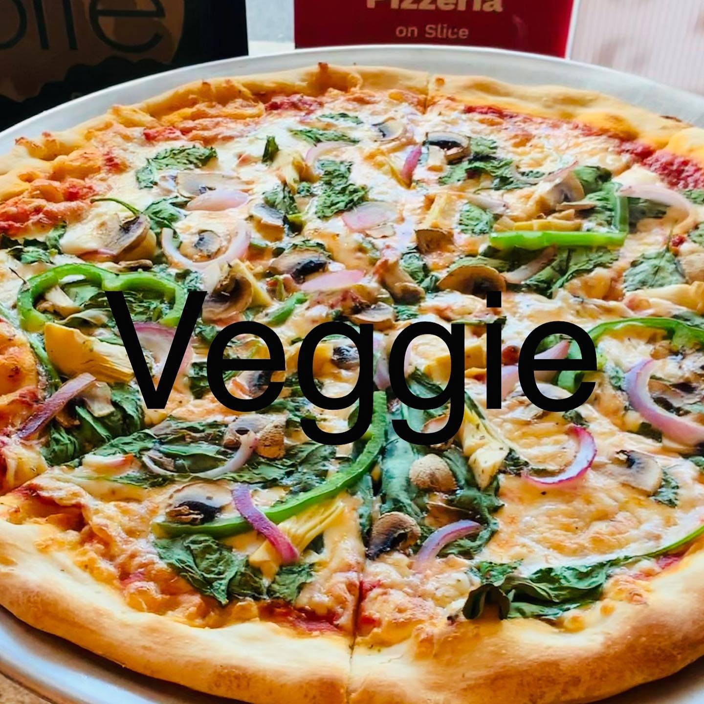 Order Veggie Lover's Pizza - Medium 12'' (8 Slices) food online from Bella's Pizzeria store, Collierville on bringmethat.com