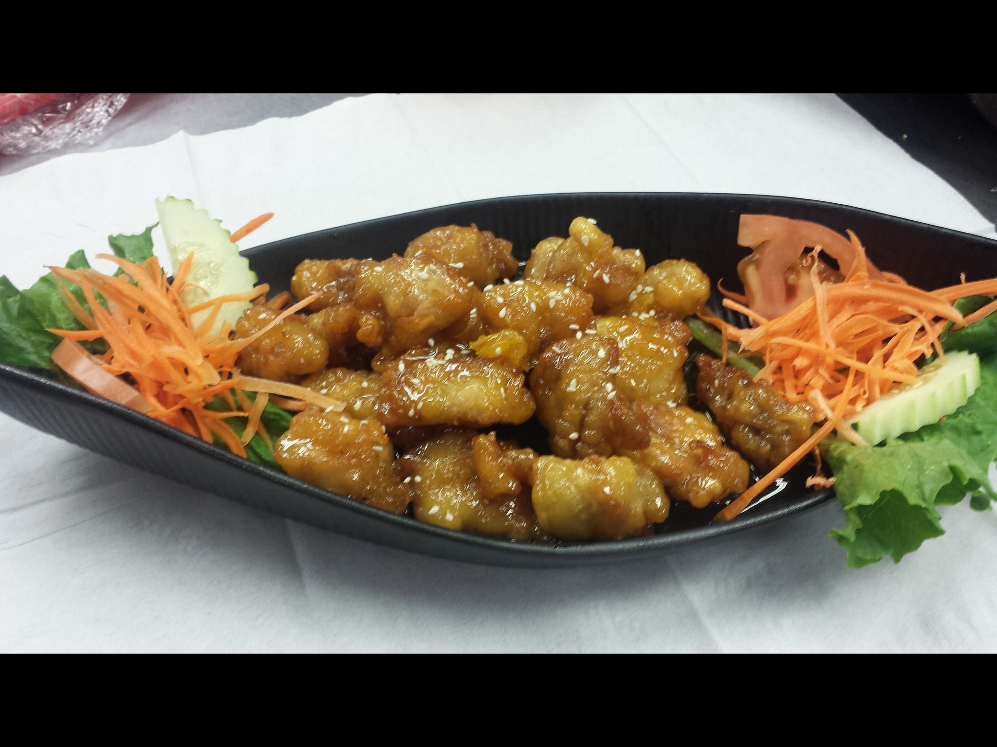 Order CS8. Orange Chicken food online from Thai Bbq & Noodles store, Cypress on bringmethat.com