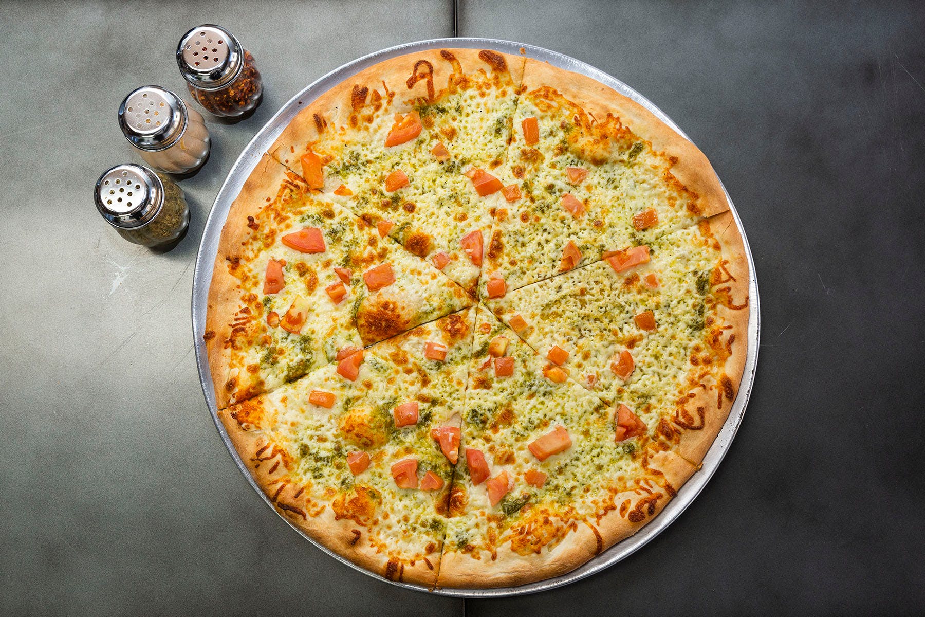 Order Pesto Pizza - Medium 14'' food online from College Pizza store, Boston on bringmethat.com