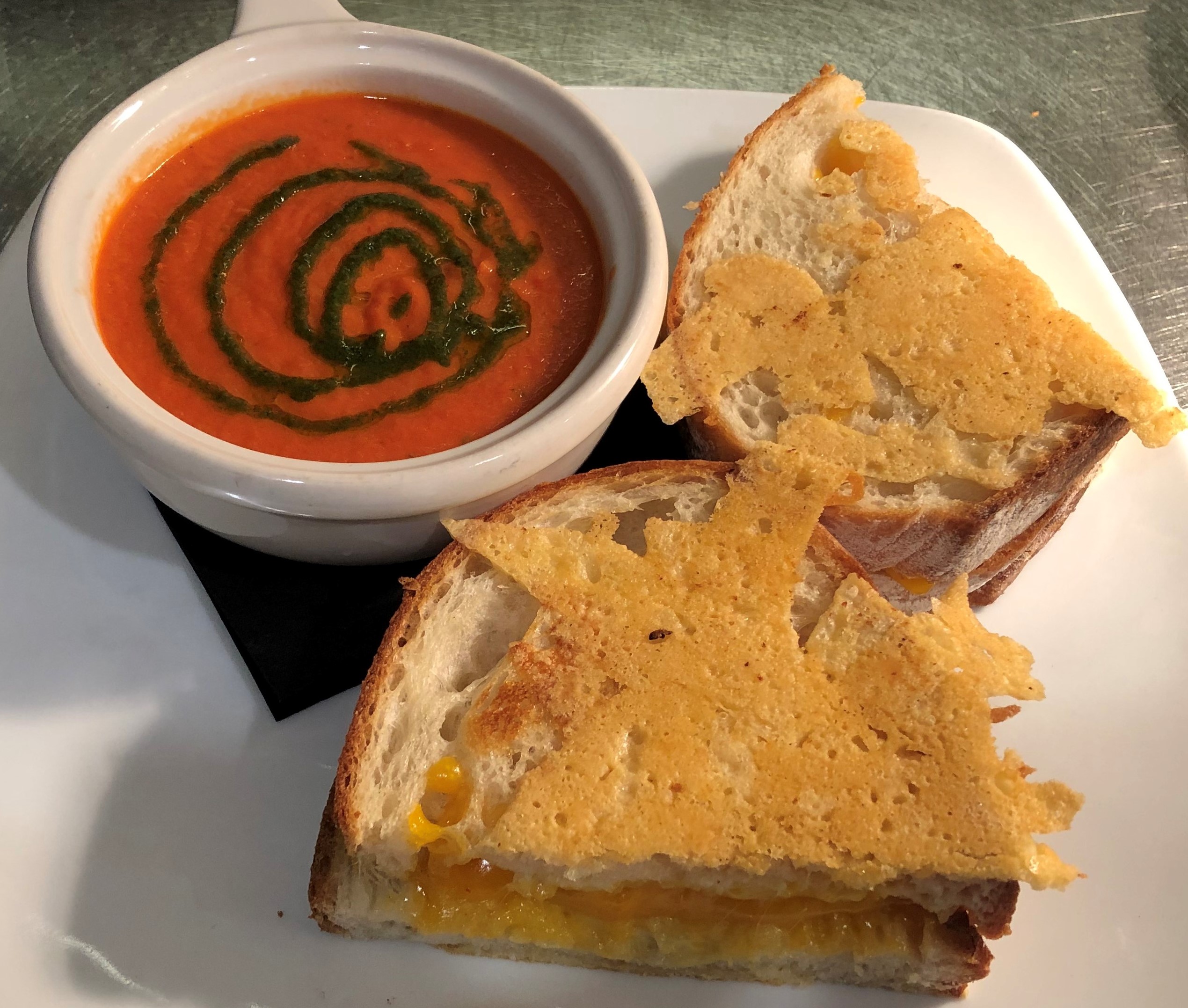 Order 3 Cheese Grill Sandwich and Tomato Soup  food online from The Fields Bar & Grill store, Portland on bringmethat.com