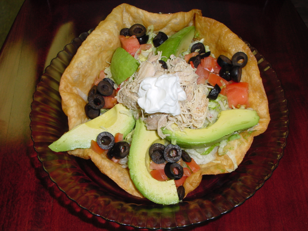 Order Taco Salad food online from North of The Border Mexican Restaurant store, Bartlett on bringmethat.com