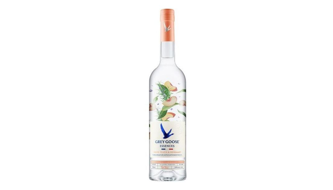 Order Grey Goose Essences White Peach & Rosemary Vodka 1L food online from Circus Liquor store, Los Angeles on bringmethat.com