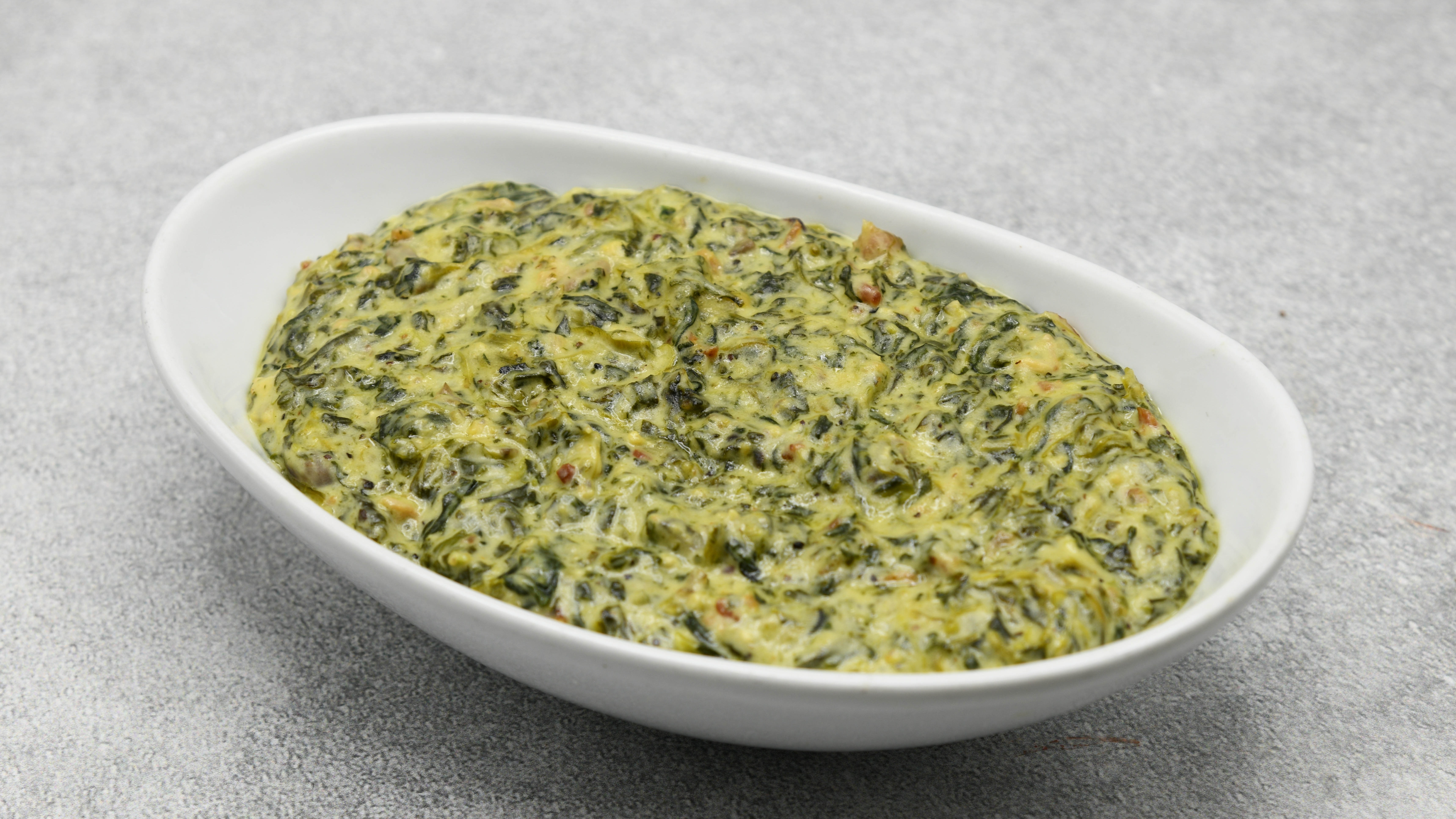 Order Creamed Spinach food online from Del Frisco's store, Houston on bringmethat.com