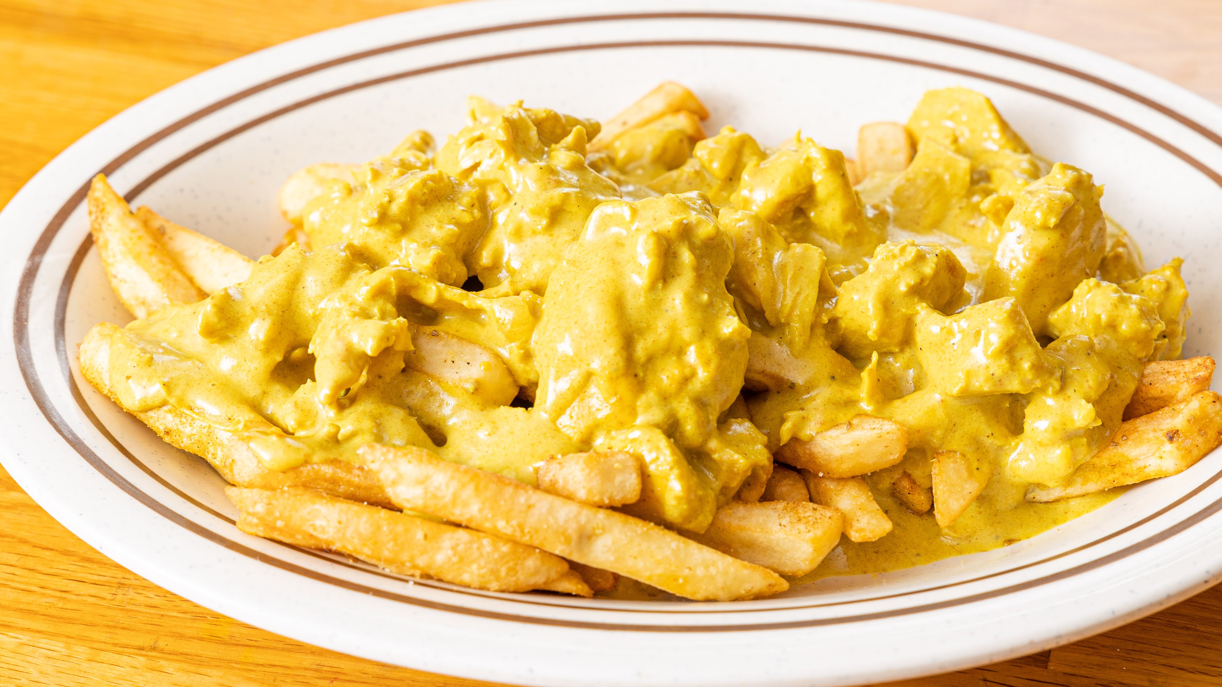 Order Chicken Curry Fries  food online from Flavors Express store, San Diego on bringmethat.com