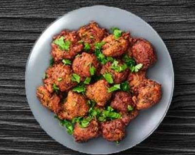 Order Golden Fried Vegetable Pakora  food online from Tick-Tock Tikka House store, Cary on bringmethat.com