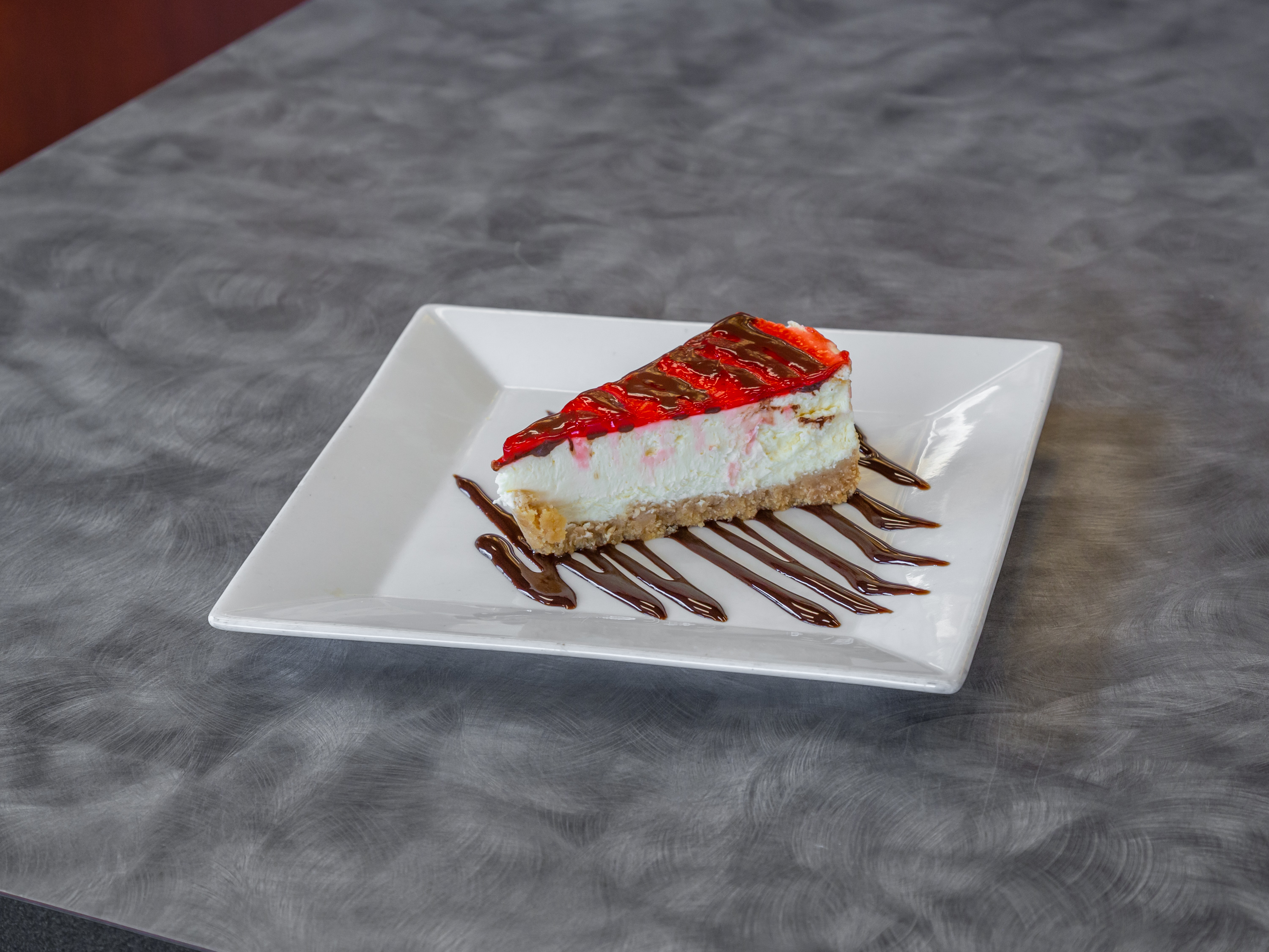Order HOMEMADE Cheesecake food online from Enzo Pizza store, Indianapolis on bringmethat.com
