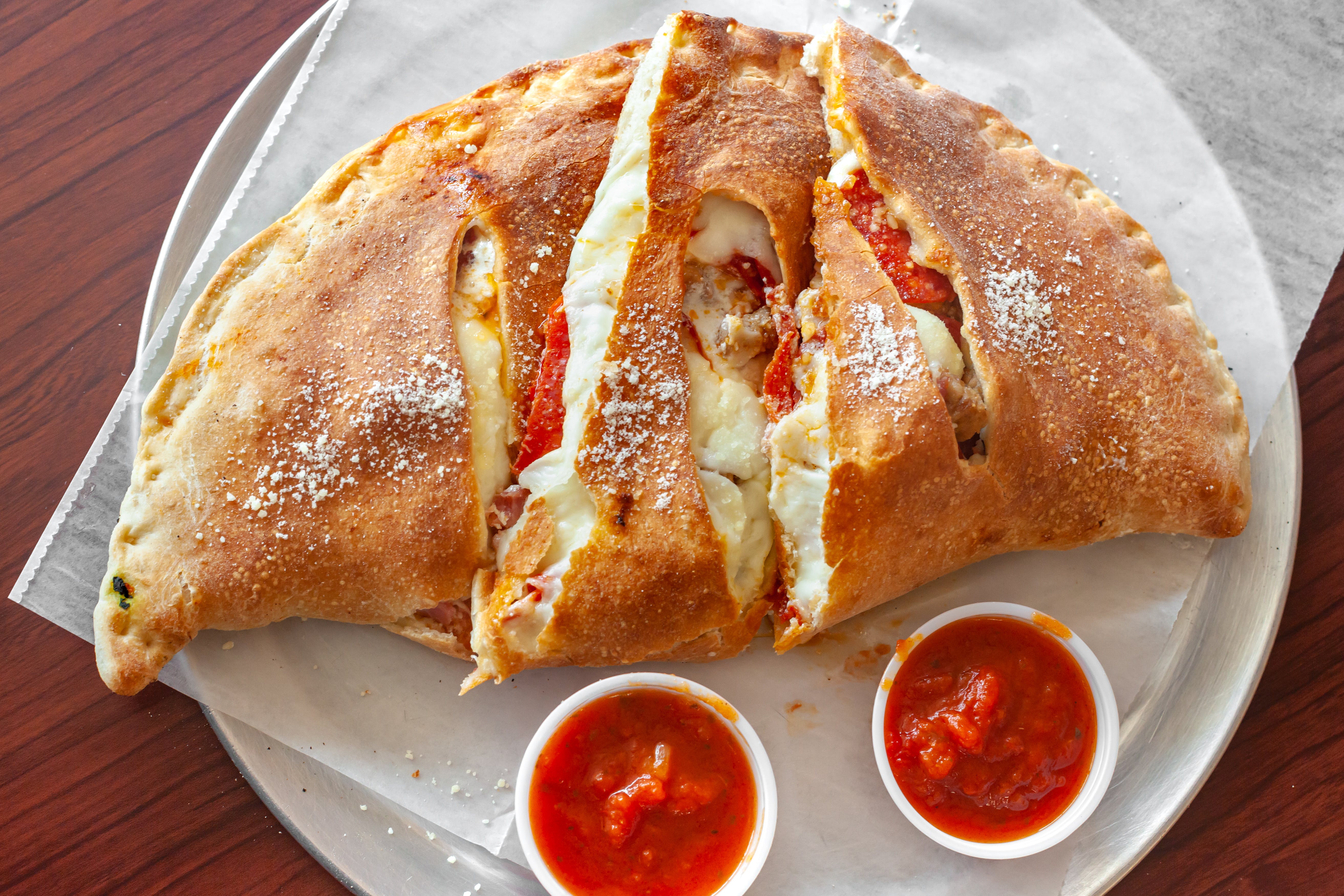 Order Original Cheese Calzone - Small food online from Apollos Pizza store, Richmond on bringmethat.com