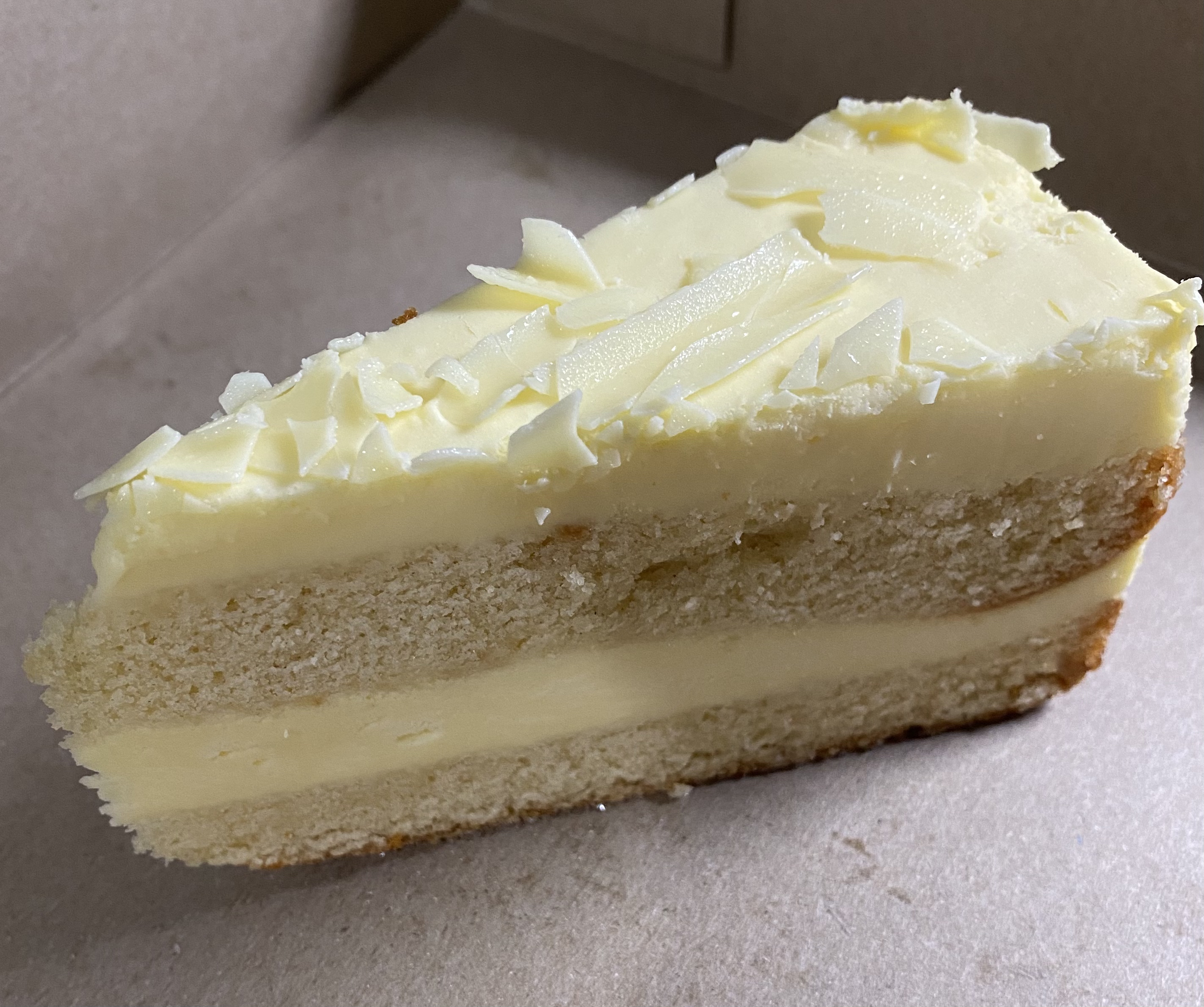 Order Slice of Lemon Cake food online from Madison's Pizza store, Albany on bringmethat.com