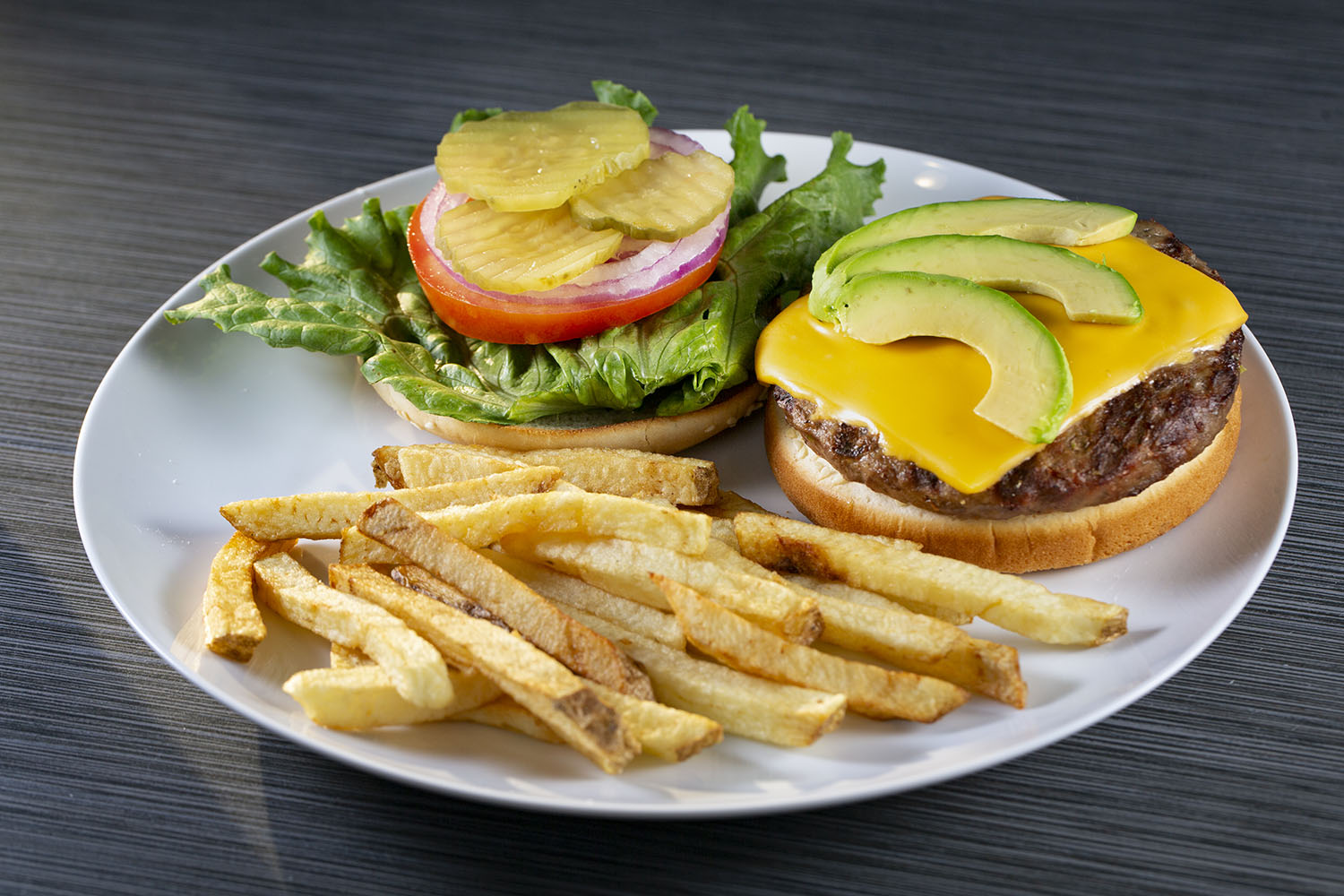 Order 47. Avocado Cheese Burger food online from Bajis' Down The Street Cafe store, Mountain View on bringmethat.com