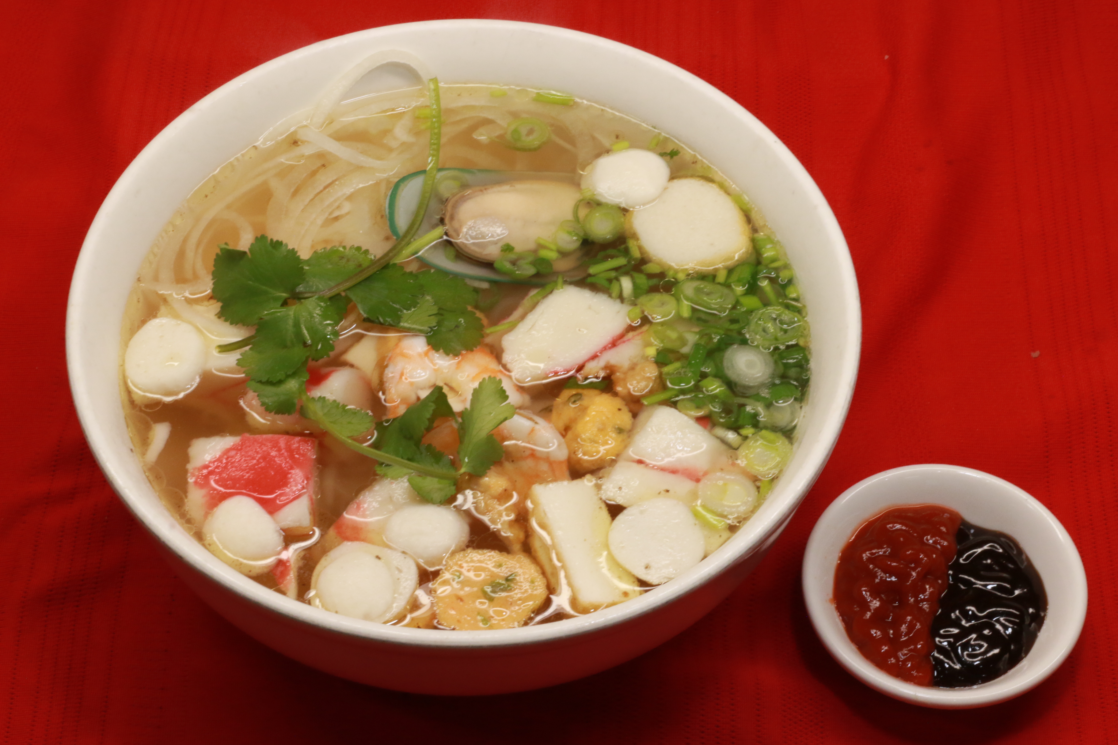 Order P10. Seafood Pho (one size only) food online from Pho Khang store, Englewood on bringmethat.com