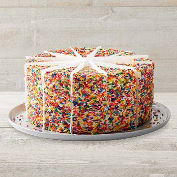 Order Carlo's Bakery Rainbow Cake - Whole Cake food online from Tgi Fridays store, Bedford Park on bringmethat.com