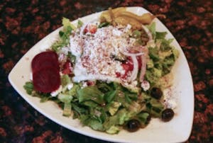 Order Greek Salad food online from Mezza Mediterranean Grille store, Southfield on bringmethat.com