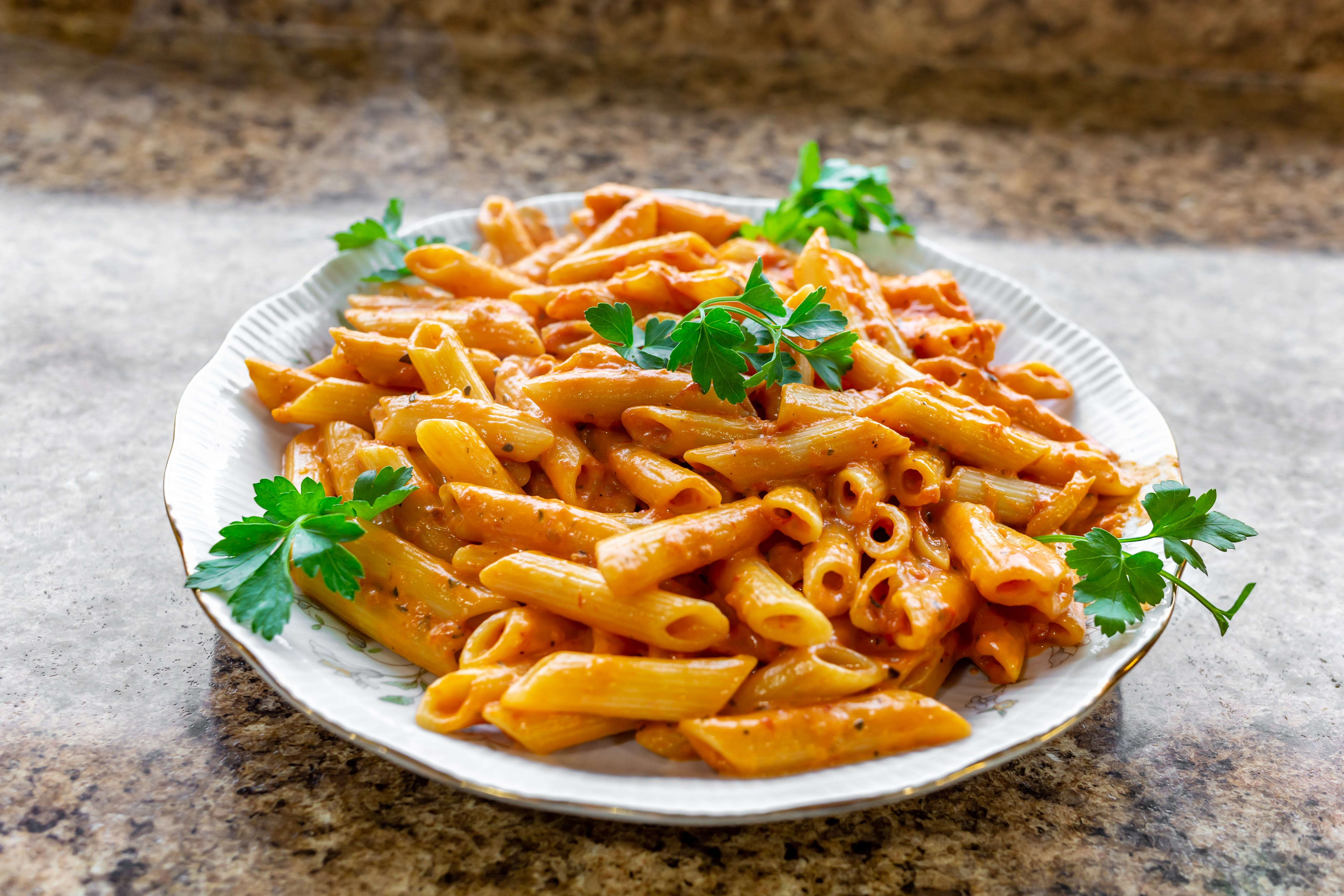 Order Penne Ala Vodka - Entree food online from Lorenzo's Pizza store, St James on bringmethat.com