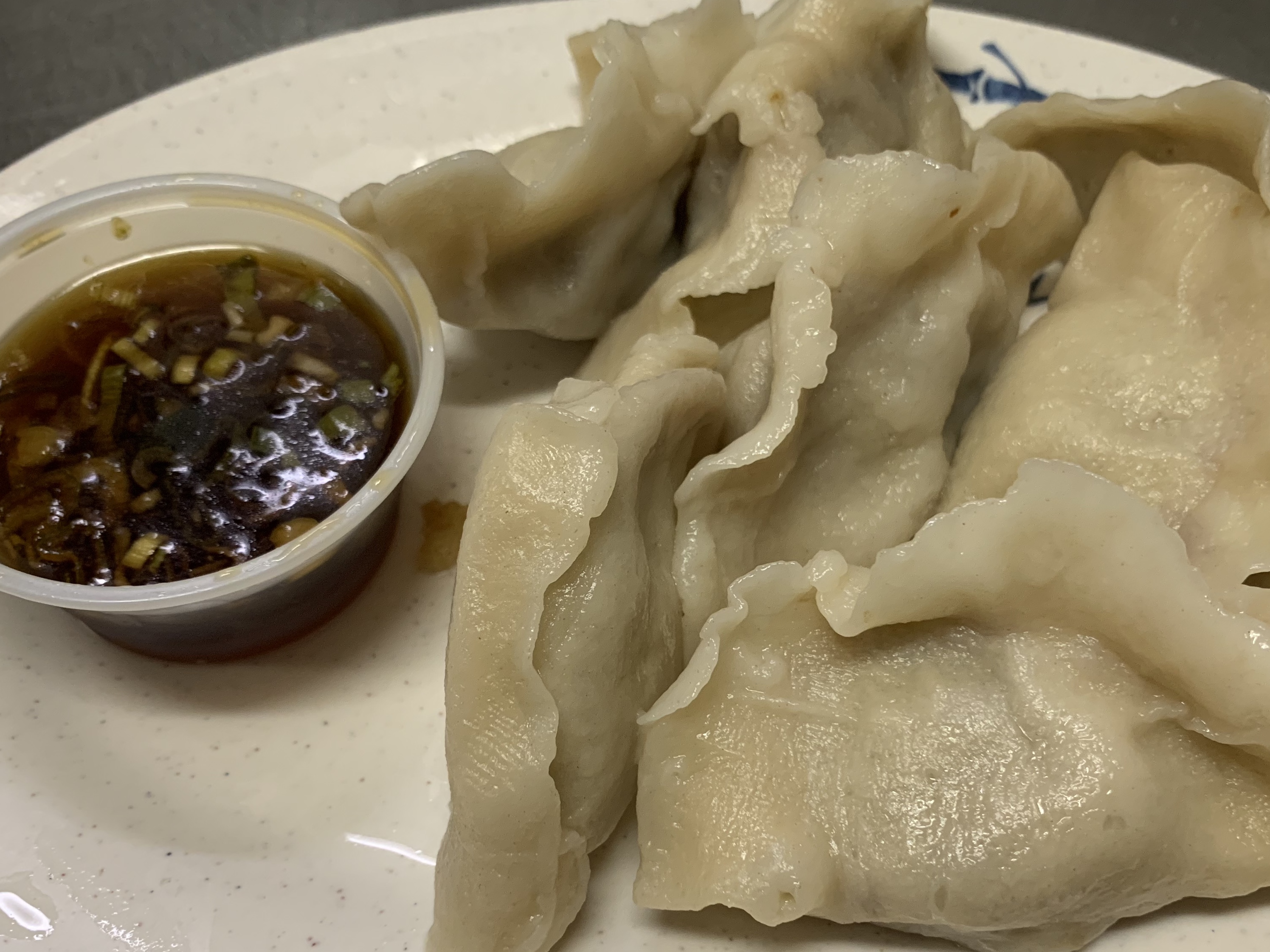 Order 6. Steamed Dumplings food online from Tsing Tao Chinese Cuisine store, Mesa on bringmethat.com