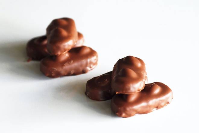 Order Milk Chocolate Happy Almonds food online from Founding Farmers store, Hunter Mill on bringmethat.com