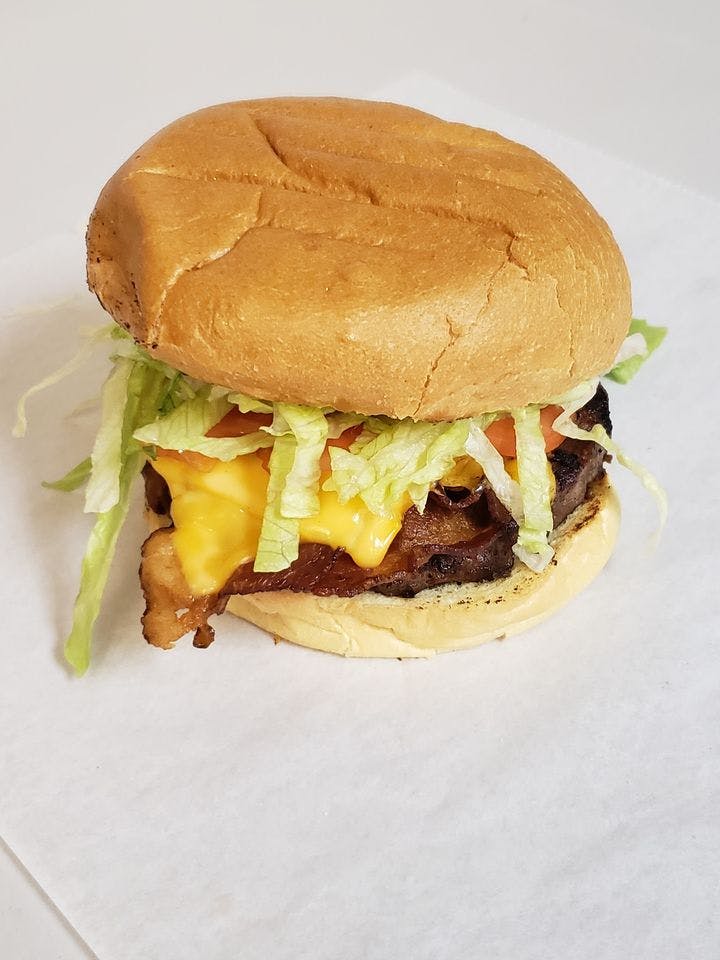 Order Bacon Cheeseburger - Burger food online from Coccos Pizza store, Springfield on bringmethat.com
