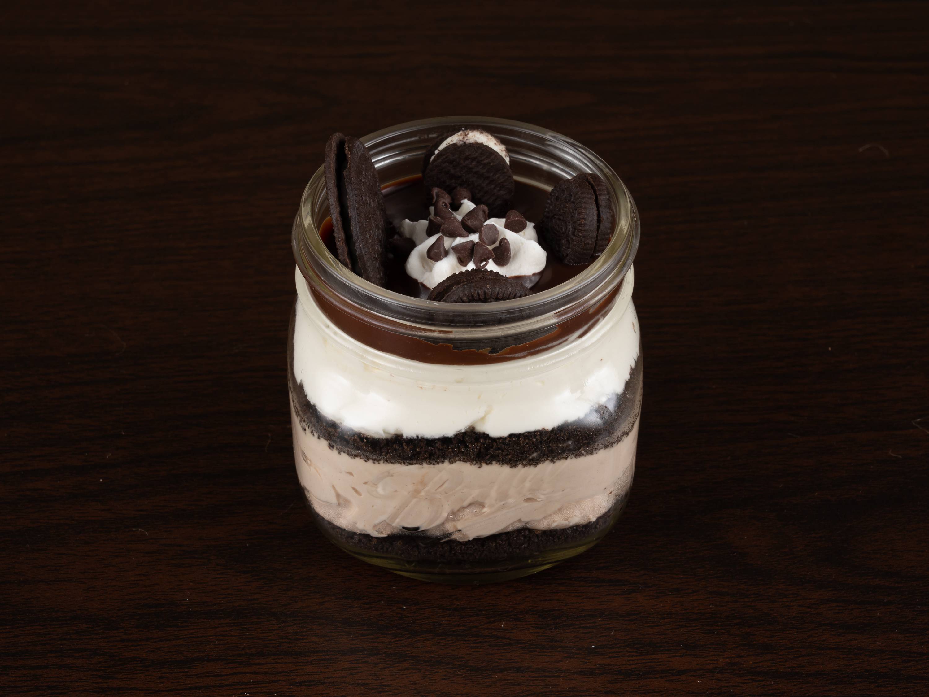 Order 8oz Oreo Cheesecake food online from Heaven In A Jar store, Sugar Land on bringmethat.com