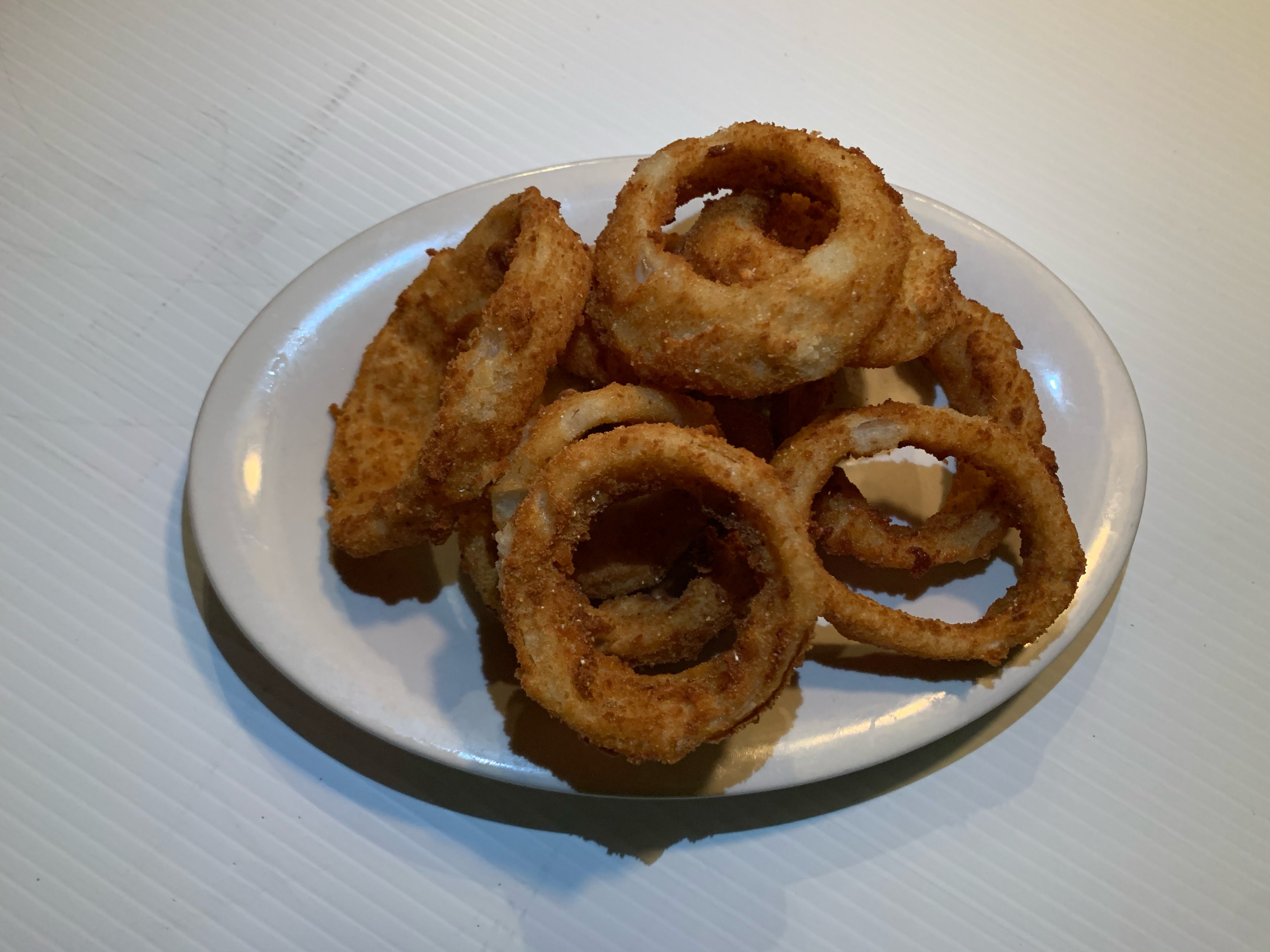 Order  Hand Breaded Onion Rings food online from Irish Coffee Bar & Grill store, Grosse Pointe on bringmethat.com