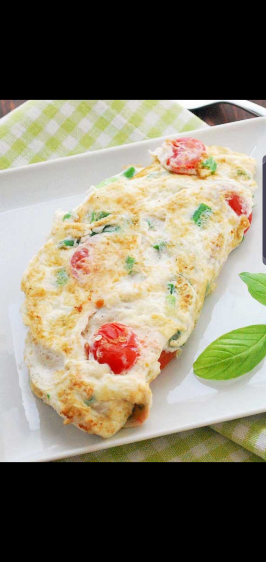 Order The Spinach And Tomato Omelet Sandwich  food online from Bedford gourmet food store, Brooklyn on bringmethat.com