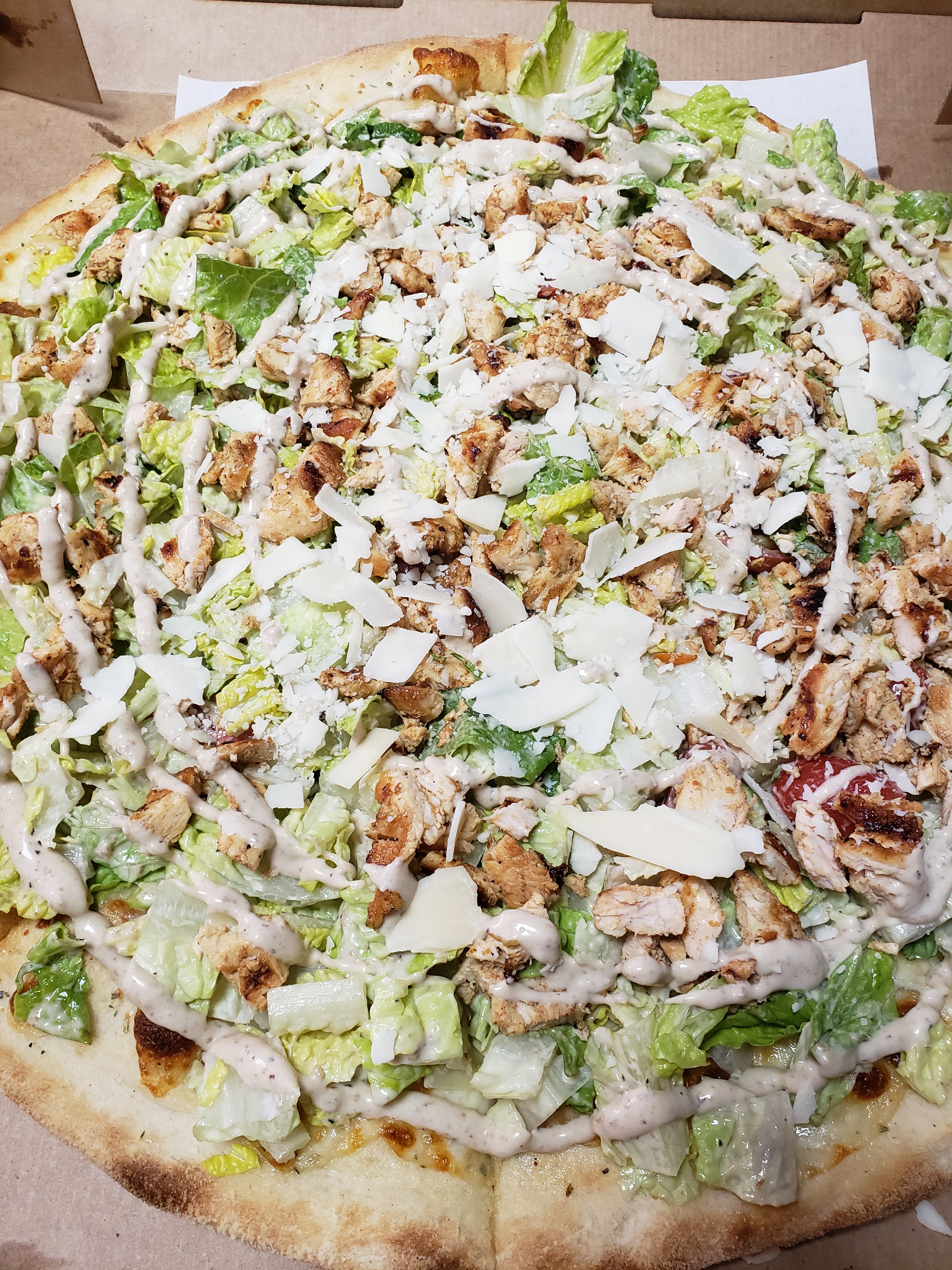 Order Caesar Salad with Grilled Chicken Pizza - Large 18" food online from Casanova store, Brooklyn on bringmethat.com