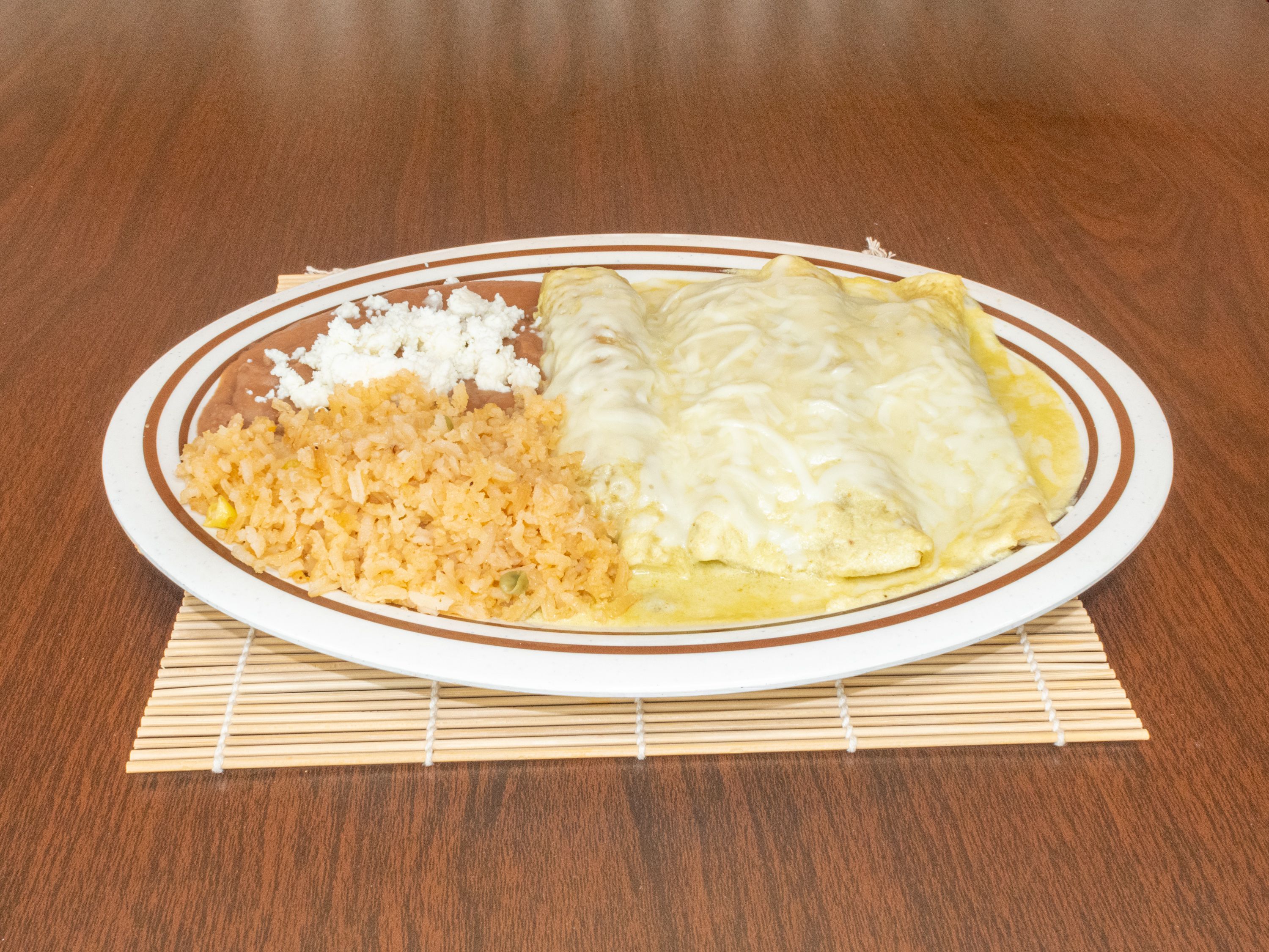 Order Enchiladas Suizas food online from Tamales Dona Tere-Wayside store, Houston on bringmethat.com