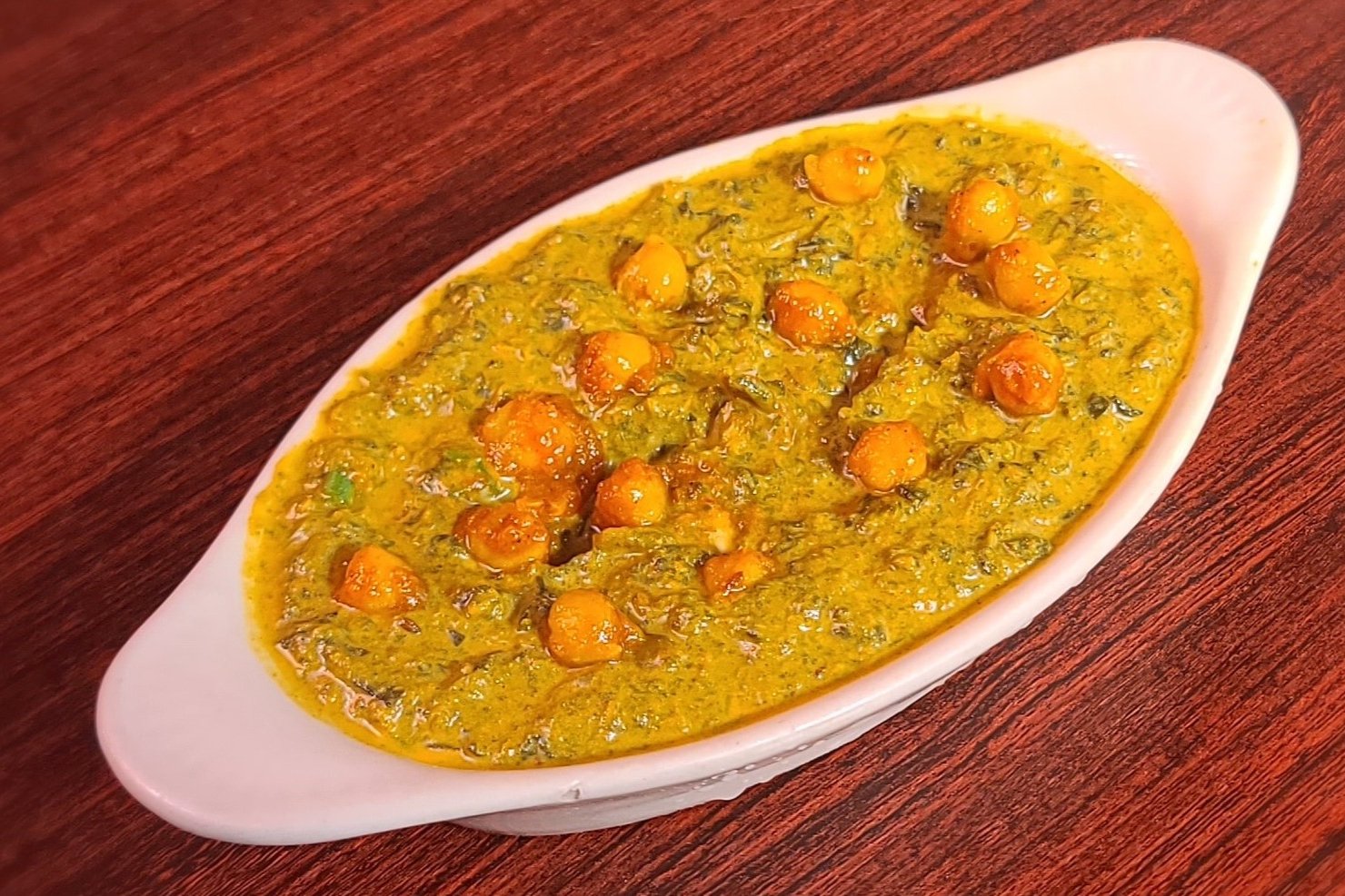 Order Chana Palak food online from Royal Indian Cuisine store, San Francisco on bringmethat.com