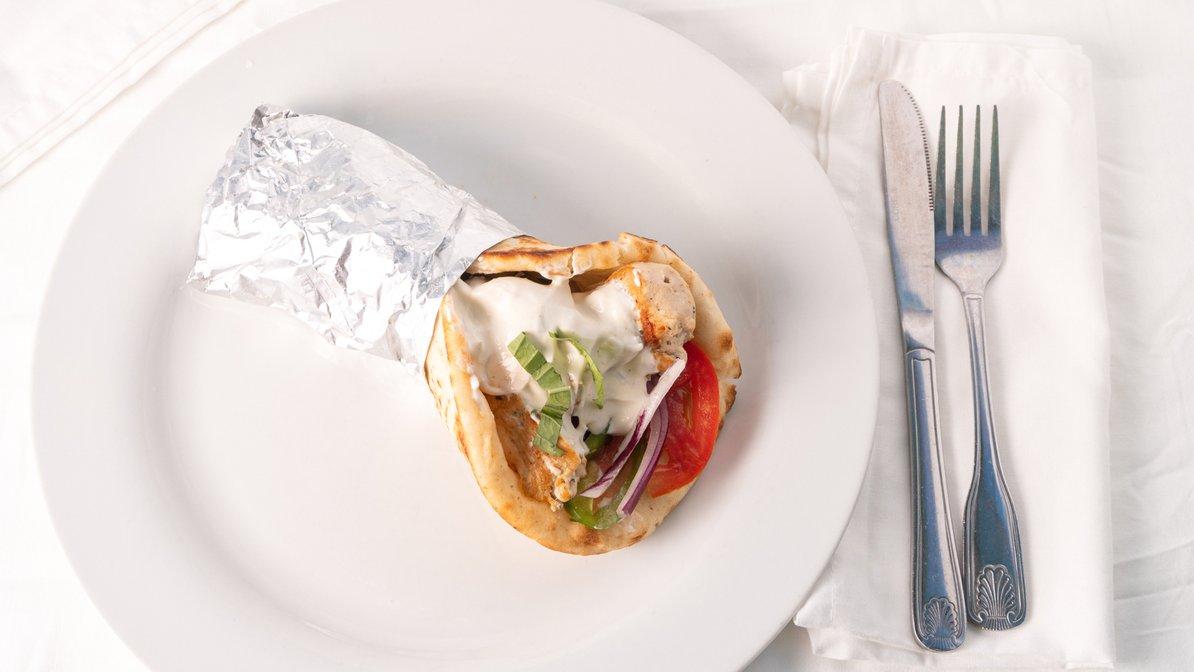 Order Chicken Souvlaki on Pita food online from Gondolier Pizza store, Clearwater Beach on bringmethat.com
