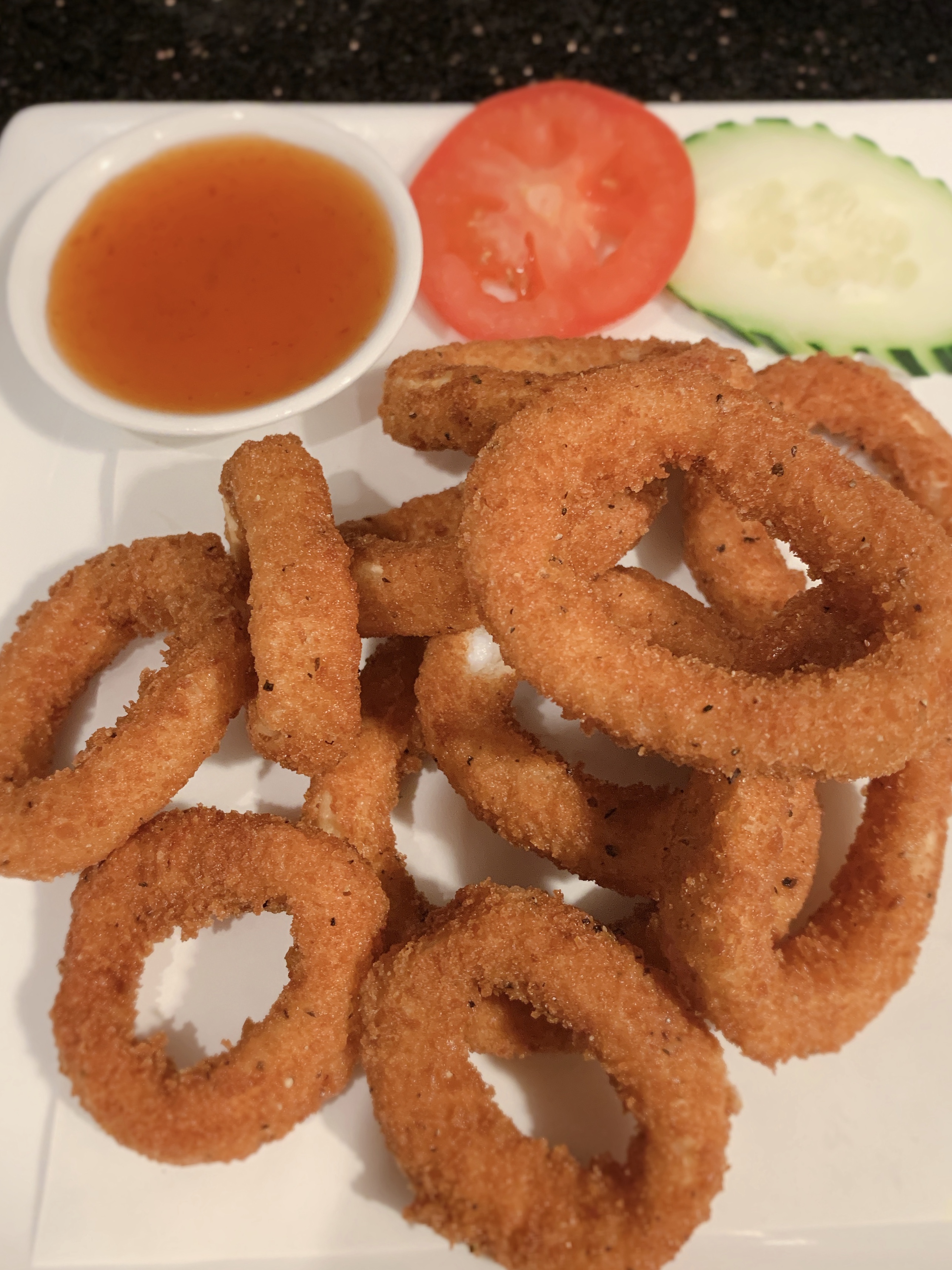 Order Fried Squid ring food online from Exotic Thai Cafe store, Woodland Hills on bringmethat.com