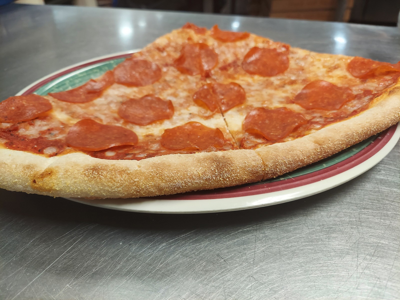 Order Slice of Neapolitan-Style Pizza food online from Big Apple Pizza store, Port Saint Lucie on bringmethat.com