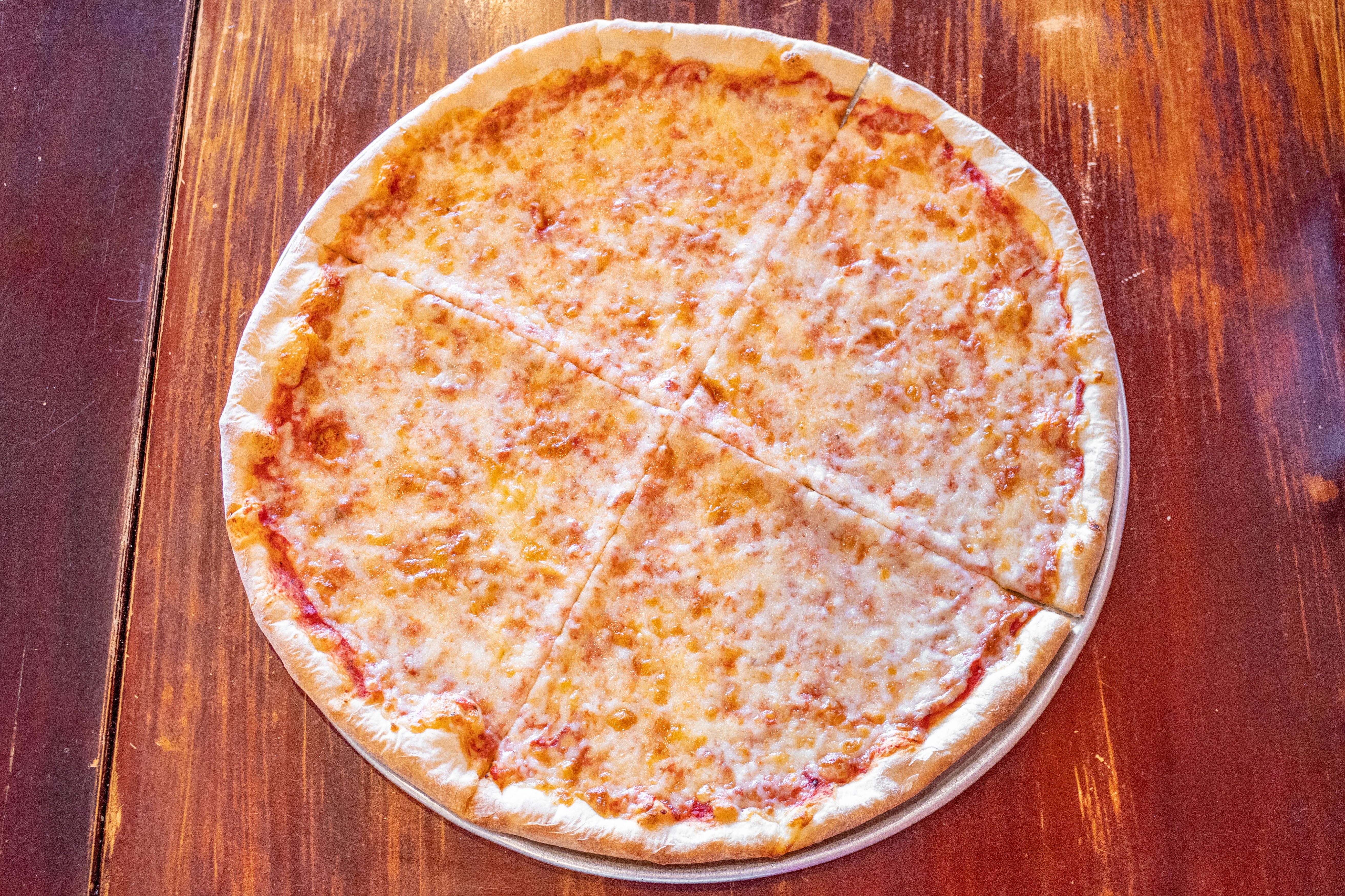 Order Cheese Pizza - Small 10'' food online from Julia's Pizza store, Orlando on bringmethat.com