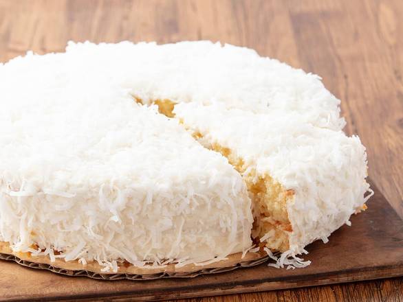 Order Whole Coconut Cream Cake food online from Eggcellence Cafe store, Houston on bringmethat.com