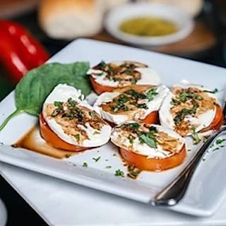Order Tomato Caprese food online from Fornos of Italy store, Houston on bringmethat.com
