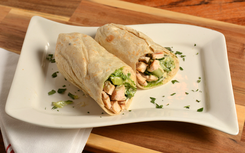 Order Grilled Chicken Caesar Wrap food online from Cinelli's Pizza store, Franklin Square on bringmethat.com