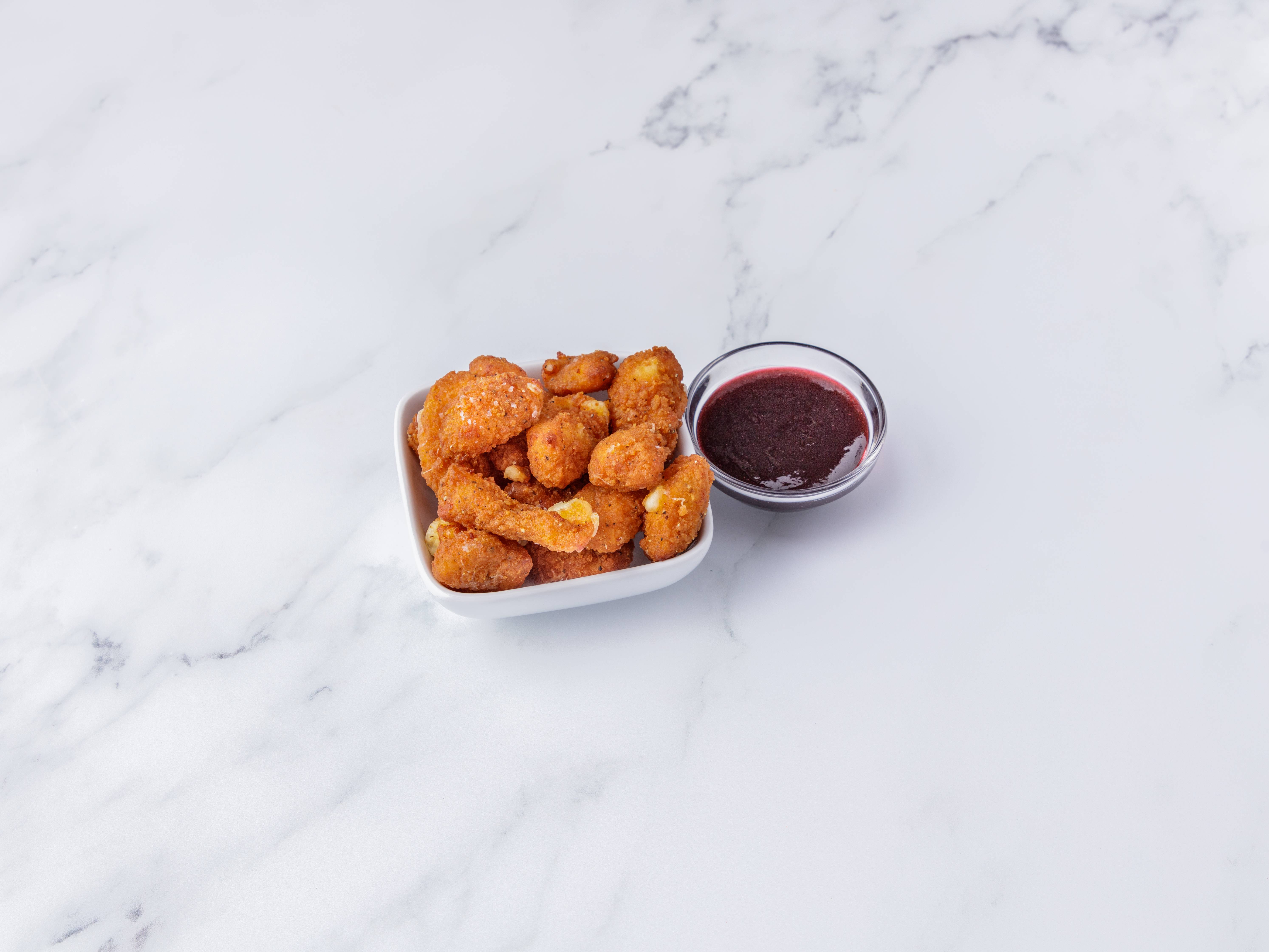 Order Beer-Battered Smoked Cheese Curds food online from Tipsy Moose Tap and Tavern store, Albany on bringmethat.com
