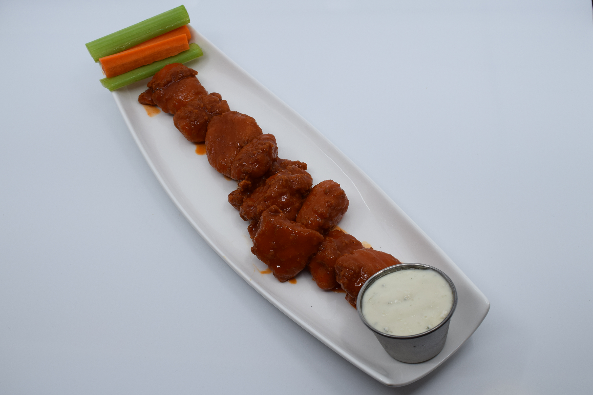 Order Boneless Buffalo Wings food online from Mad House Comedy Club store, San Diego on bringmethat.com