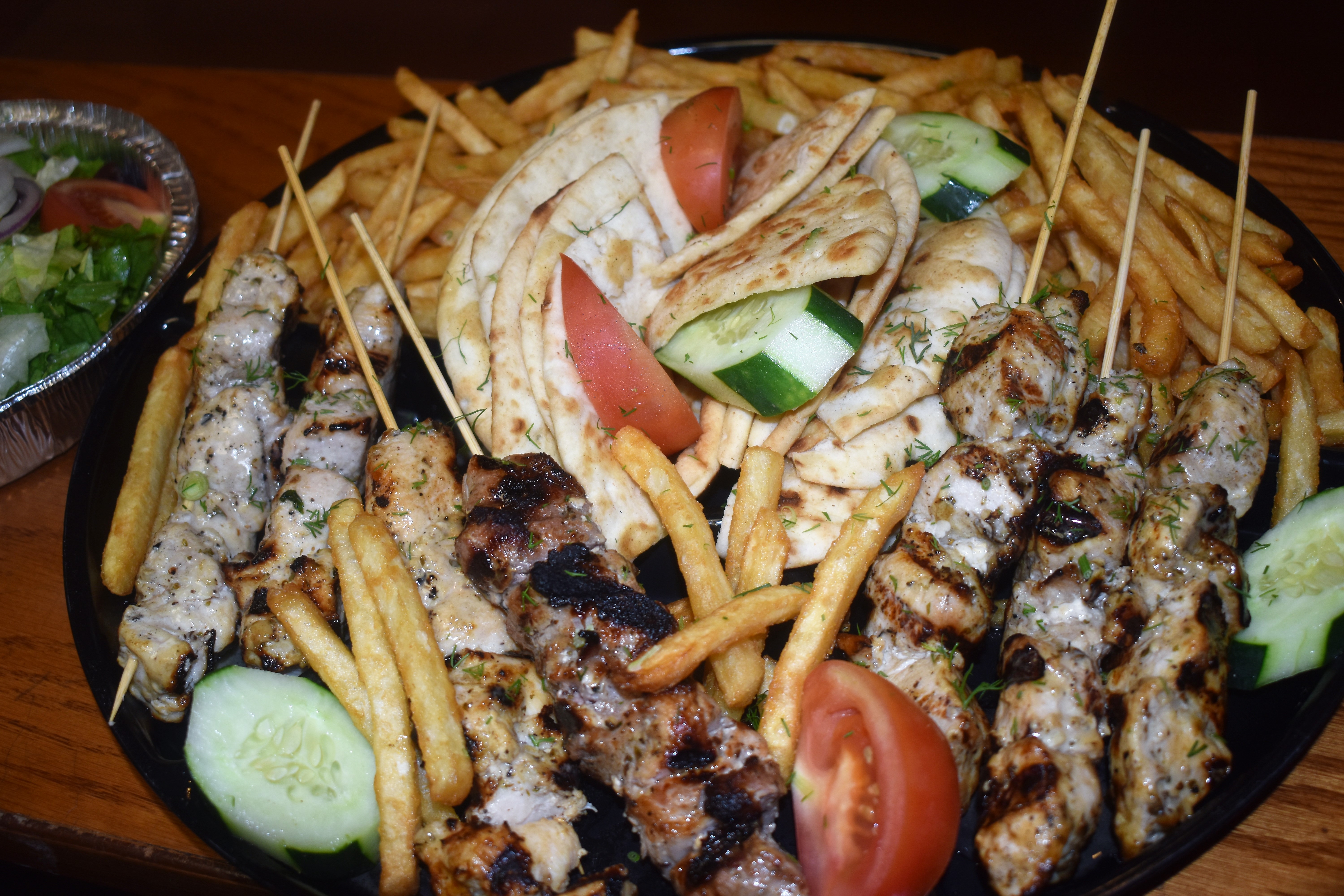Order Souvlaki Family Pack food online from Yummy Gyro store, Willston Park on bringmethat.com