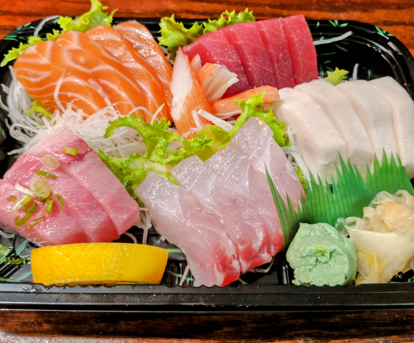 Order 11. Sashimi Deluxe food online from Bay Sushi store, Brooklyn on bringmethat.com