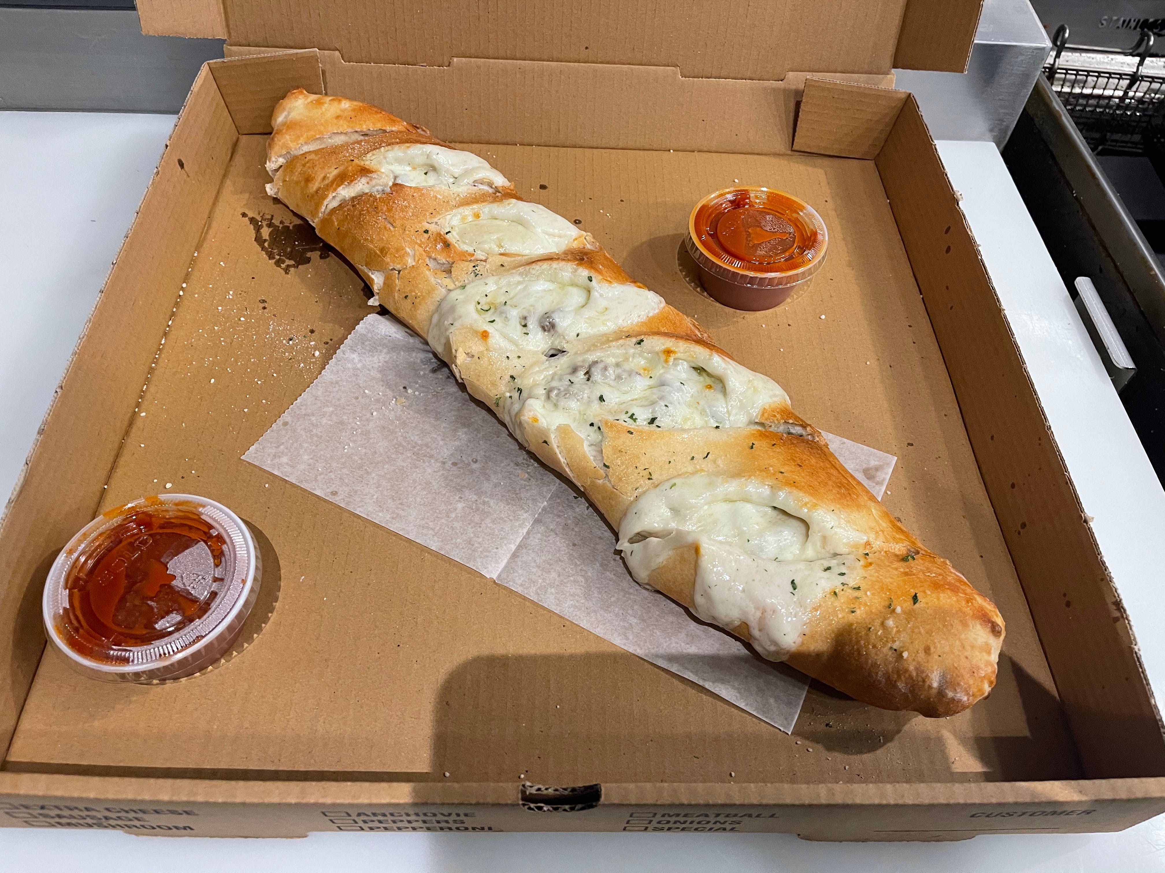 Order Italian Stromboli - Small 14" food online from Niko Pizza store, Harrisburg on bringmethat.com