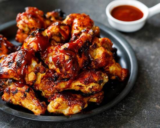 Order Bourbon Wings food online from Firebelly Wings store, Fairburn on bringmethat.com