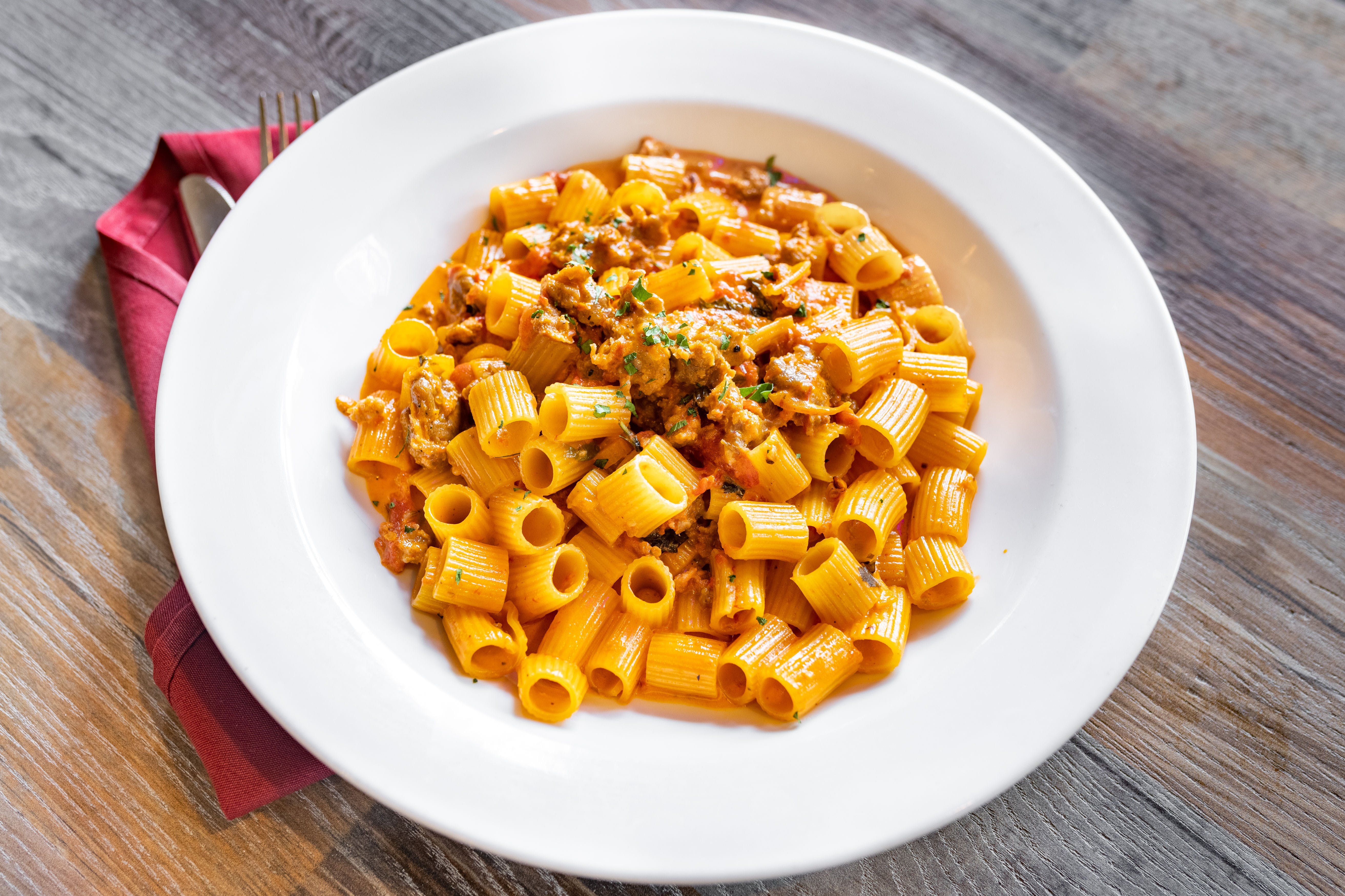 Order Rigatoni Sausage & Cream - Pasta food online from Table 42 store, Dover on bringmethat.com