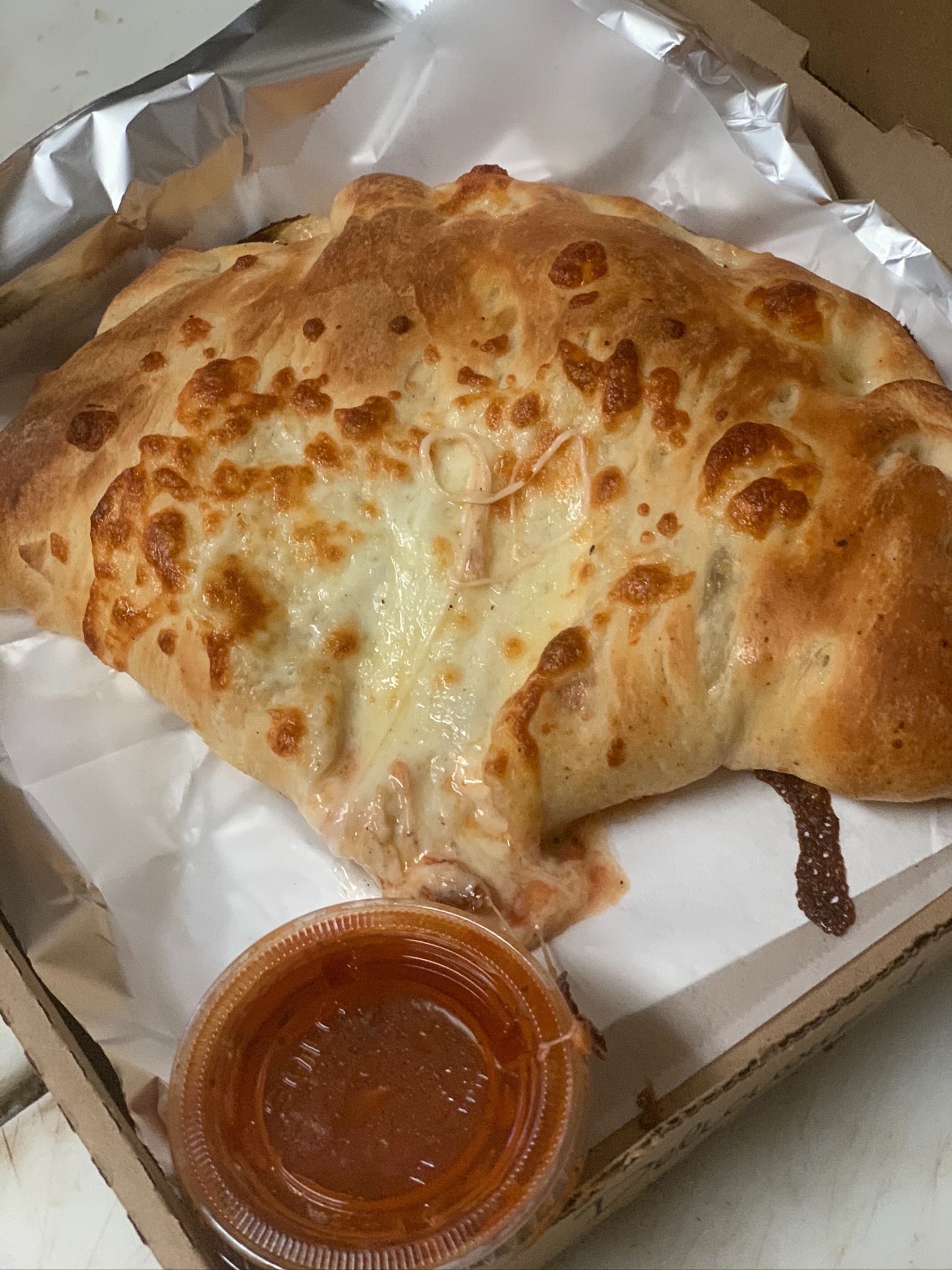 Order Spinach Calzone food online from Boston Pizza store, Las Vegas on bringmethat.com