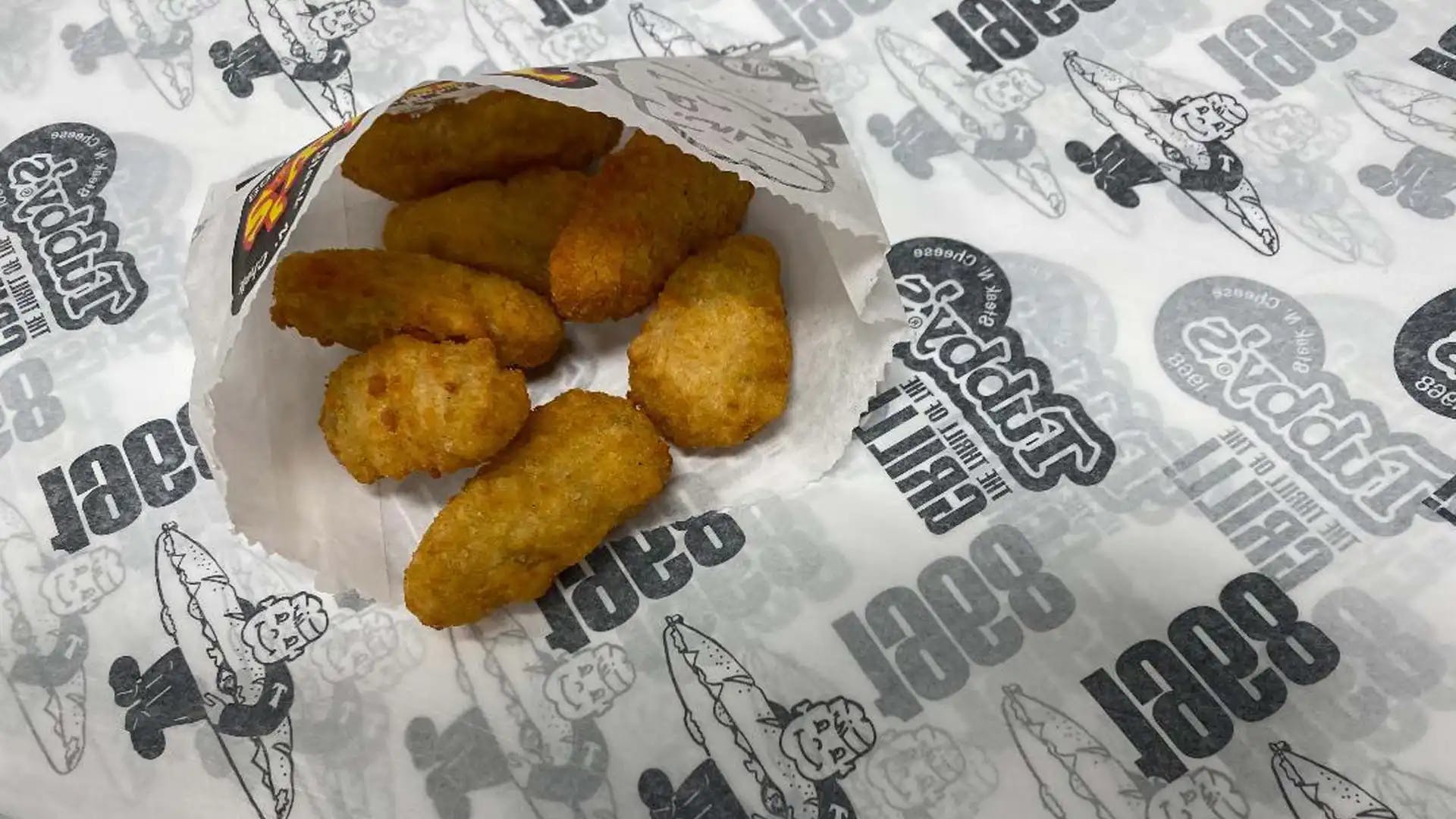 Order Jalapeno Cheddar Poppers - Side food online from Tubby's Grilled Submarines store, Westland on bringmethat.com