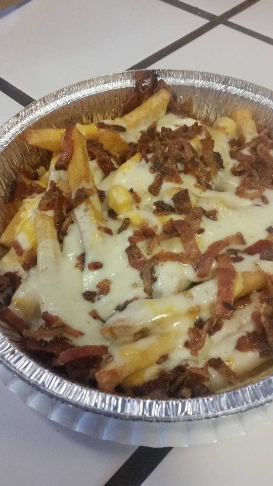 Order Bacon Cheese Fries - Appetizer food online from Luigi Pizza store, Dover on bringmethat.com