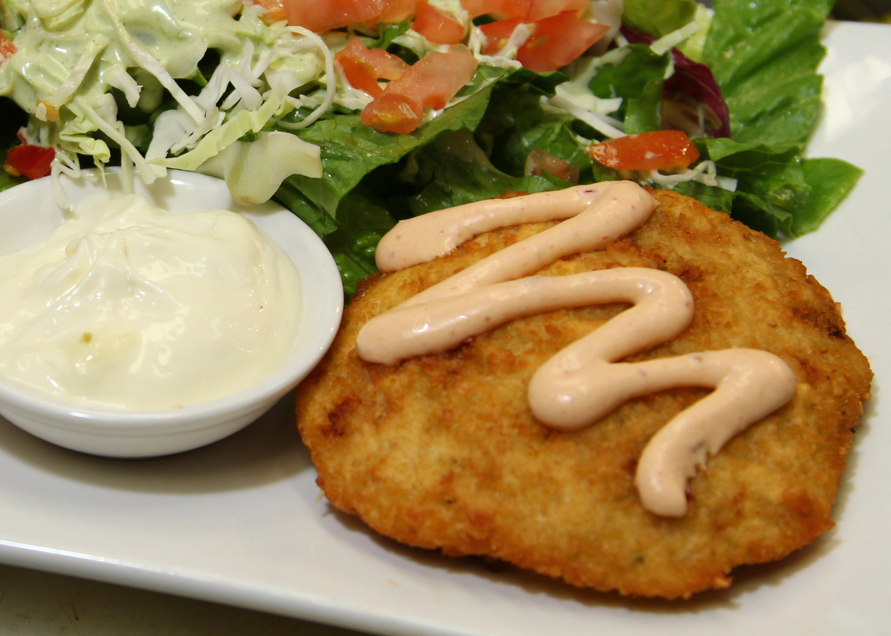 Order Crab Cakes food online from Bluesalt Fish Grill store, Redondo Beach on bringmethat.com