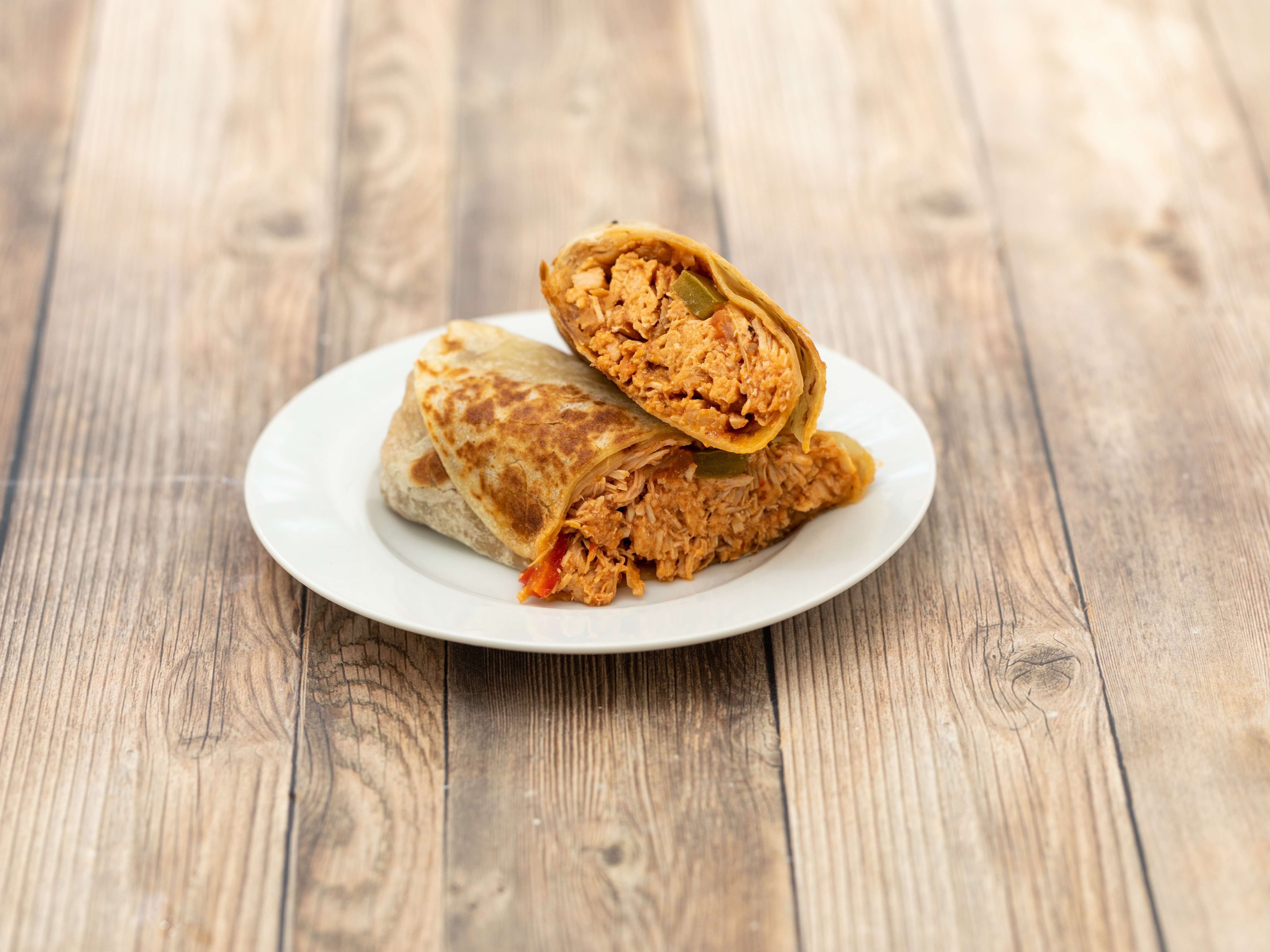 Order Chicken Burrito food online from Penelopes Mexican Food store, San Diego on bringmethat.com