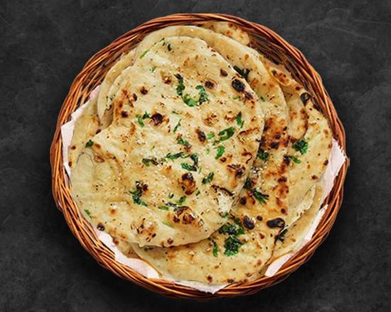 Order Garlic Naan Bread food online from United Kitchens Of India store, Alpharetta on bringmethat.com