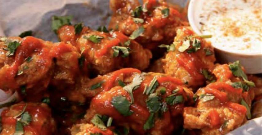 Order (8 Ct) Boneless Bites food online from Wing Daddy Express - store, El Paso on bringmethat.com