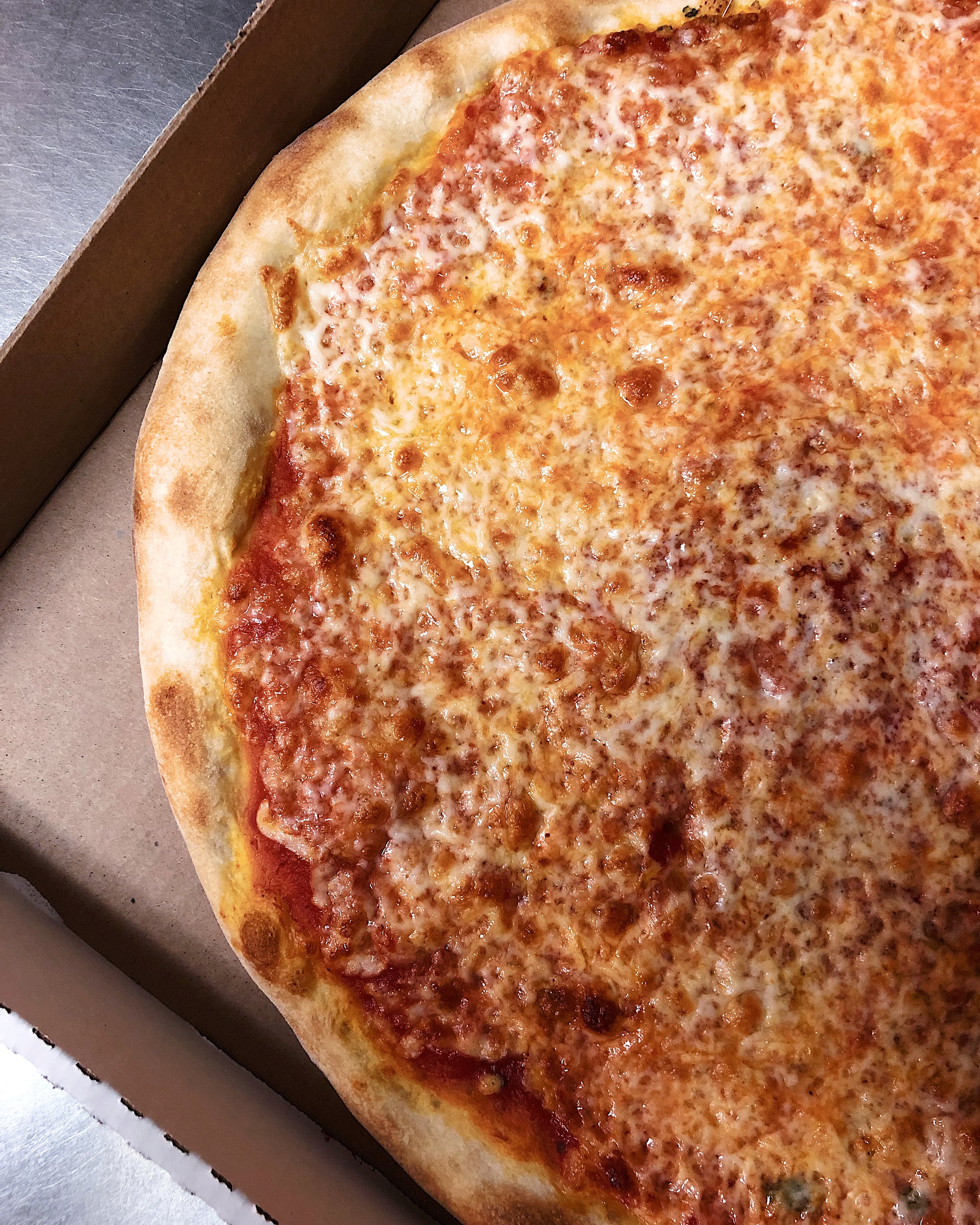 Order Traditional Cheese Pizza - Personal 10'' (8 Slices) food online from Top Tomato Bar & Pizza store, Philadelphia on bringmethat.com