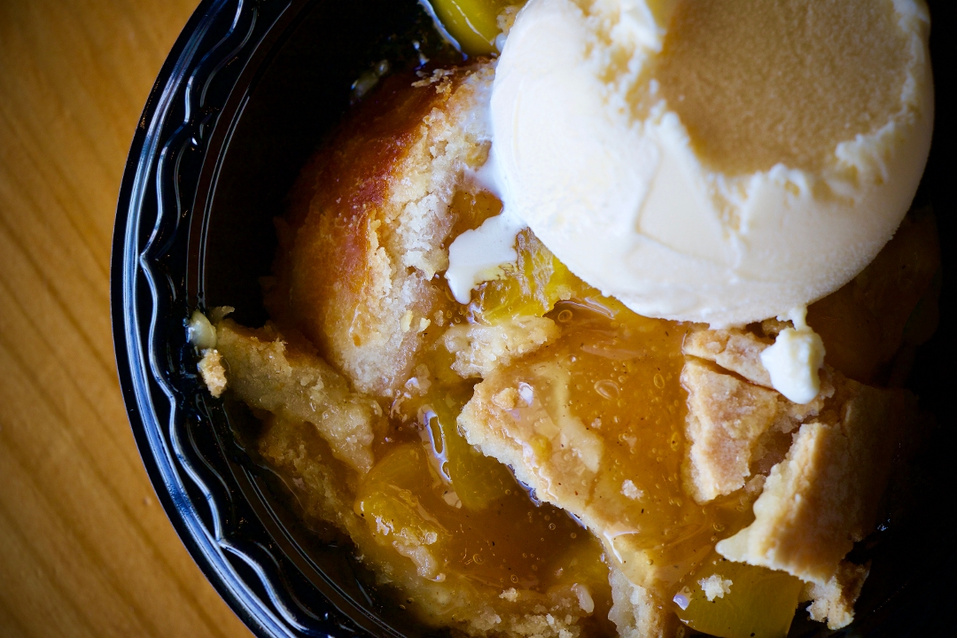 Order Peach Cobbler food online from 2 Guys 1 Pit Bbq & Catering store, Tomball on bringmethat.com