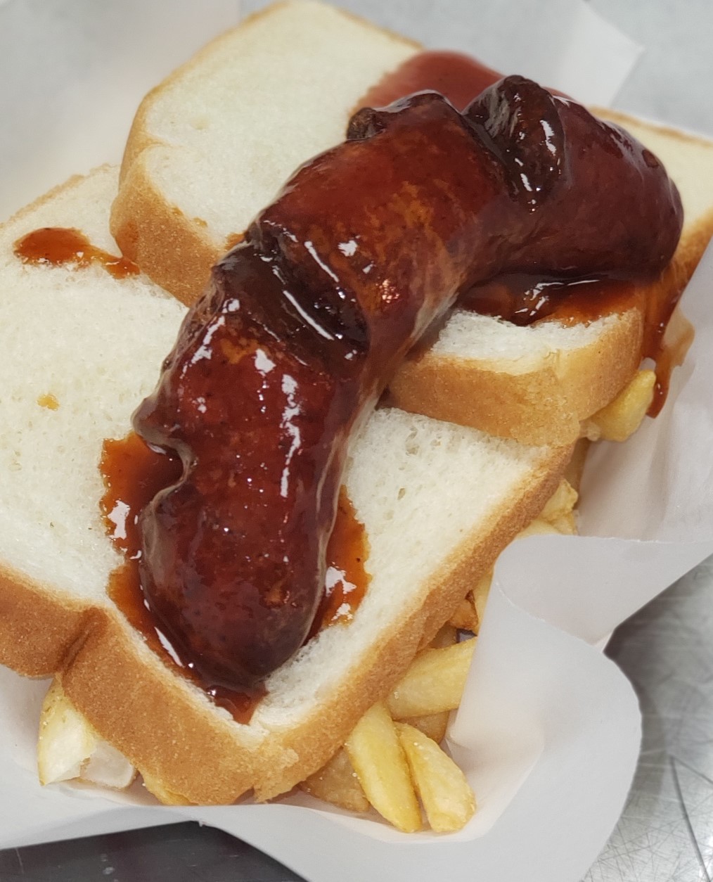 Order SPICY Pork Link Sandwich with Fries food online from Boonie Mac Shack store, Zion on bringmethat.com